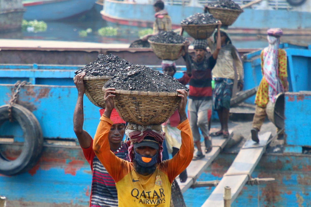 Men working in a coal mine in Bangladesh