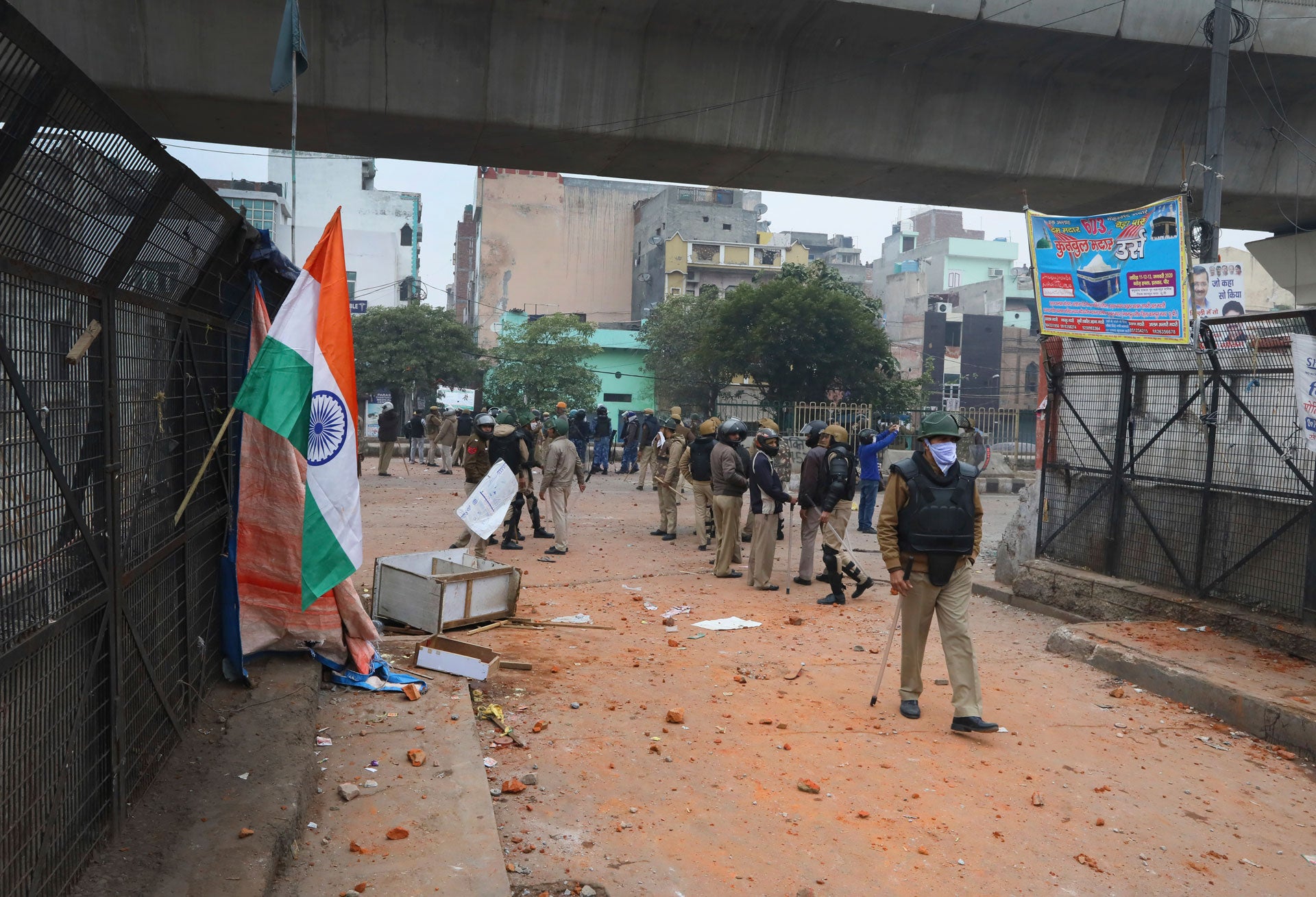 Police stand guard during a protest against a new citizenship law at the Seelampur area of New Delhi, India, February 20, 2020. 