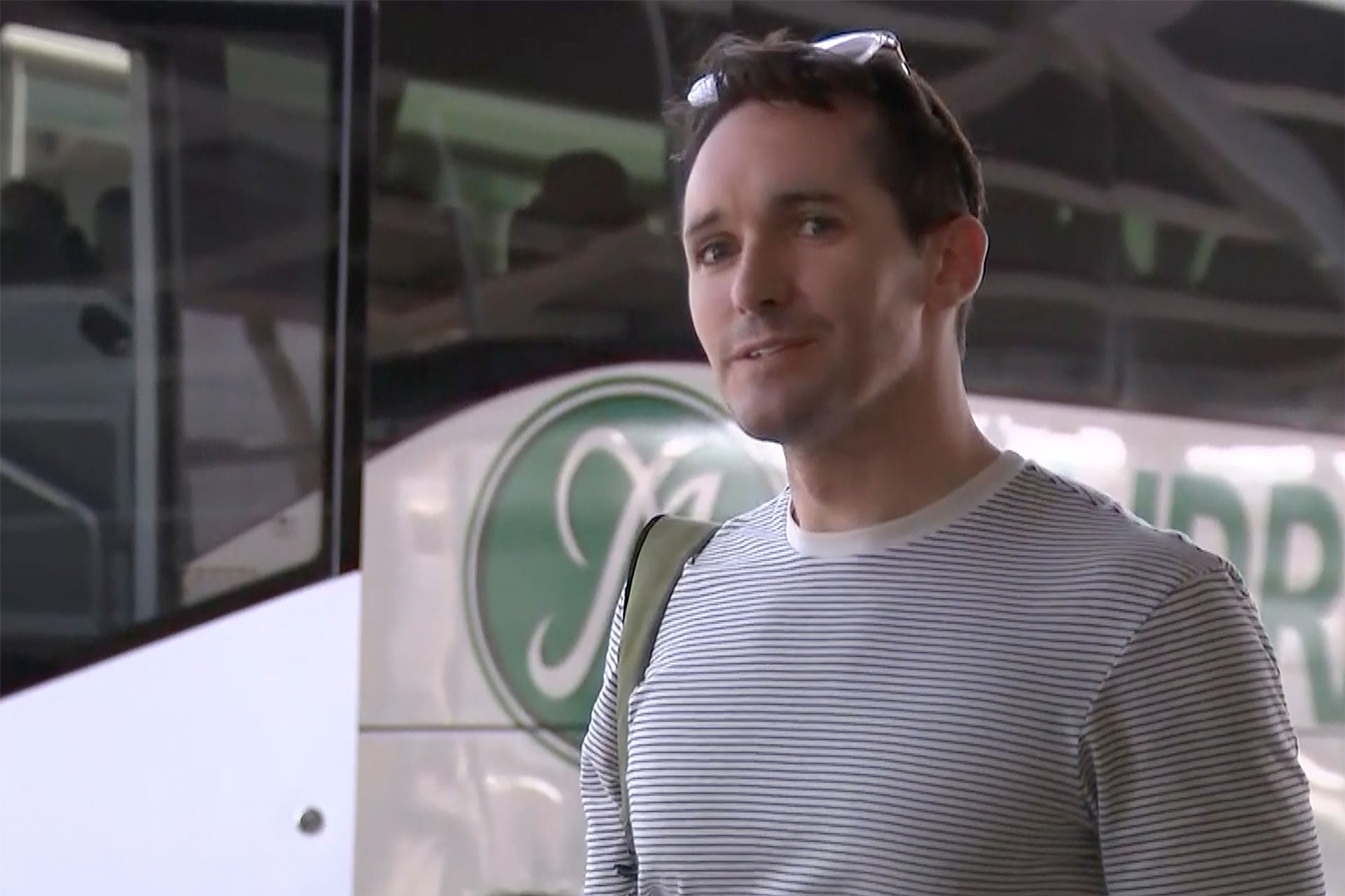 In this image made from a video, Australian Broadcasting Corp. journalist Bill Birtles speaks to the media on his arrival at Sydney airport, Australia, September 8, 2020.