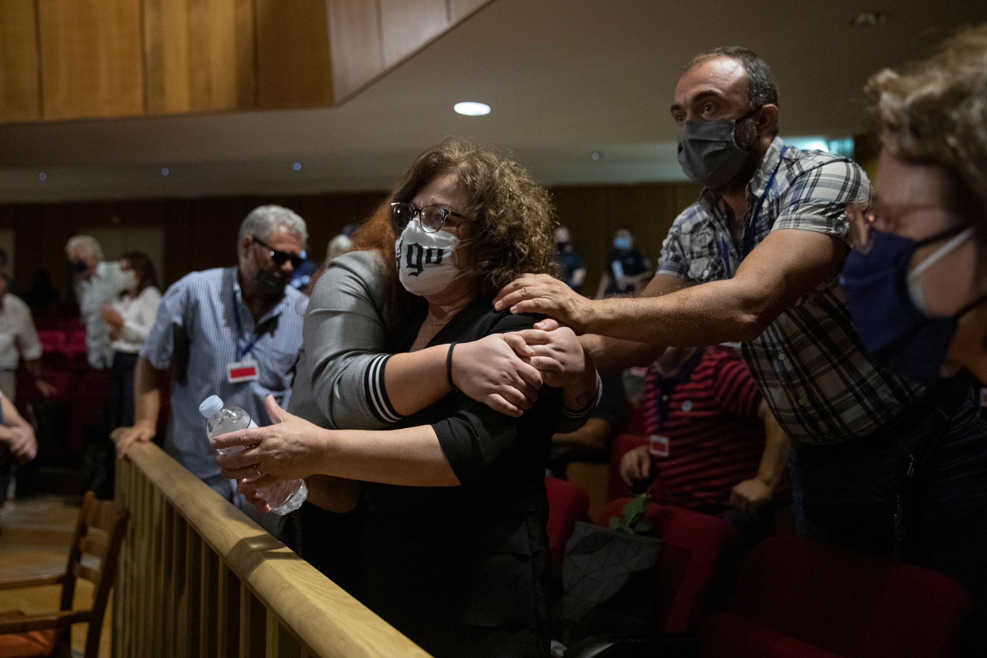 Magda Fyssa, the mother of late Greek rap singer Pavlos Fyssas, who was stabbed and killed by a supporter of the extreme right Golden Dawn party in 2013, celebrates immediately after the delivery of the verdict in Athens, October 7, 2020. 
