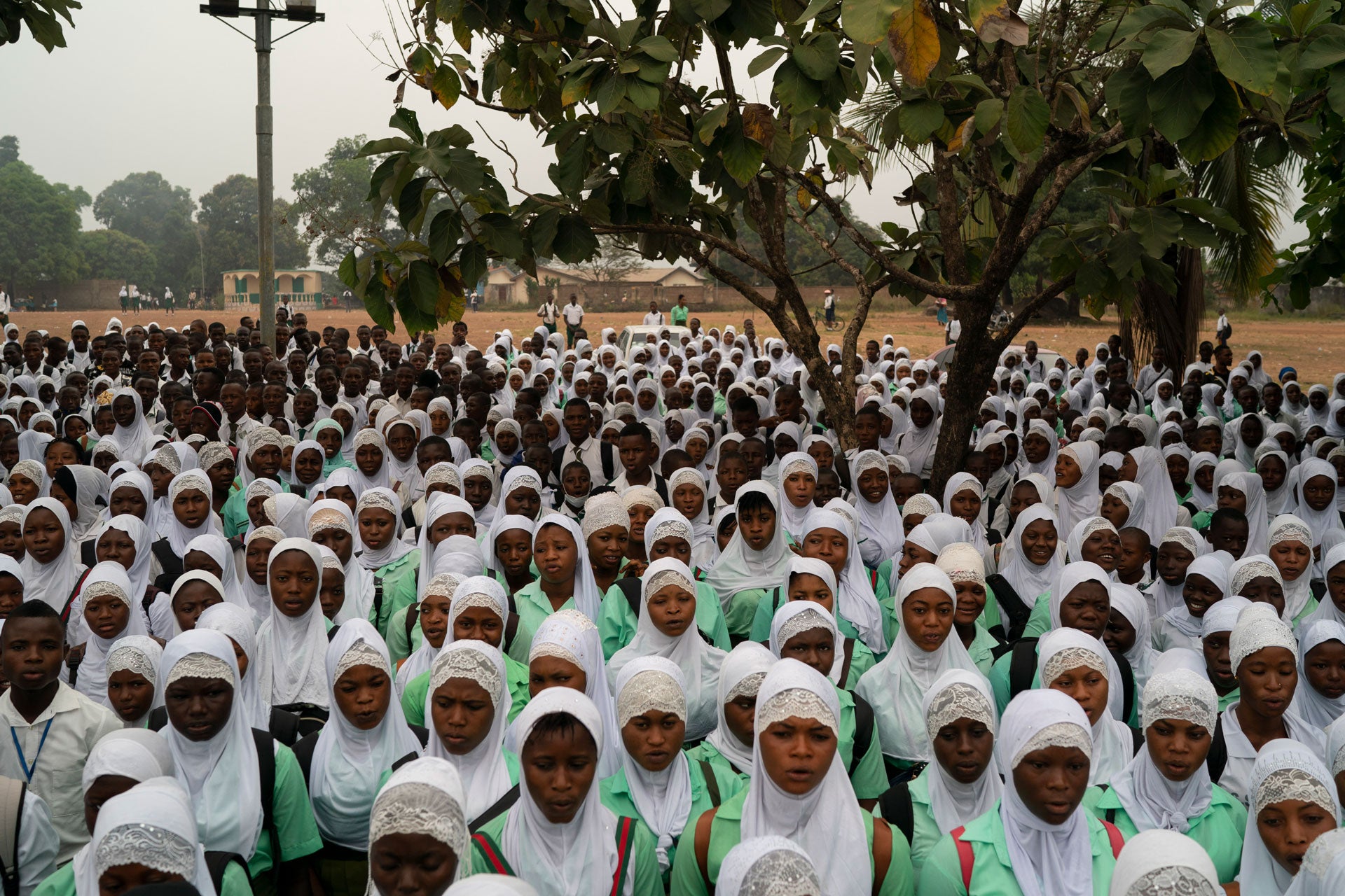 Students sing the national anthem before class at a secondary school in Koidu, district of Kono, Sierra Leone, November 20, 2020. 