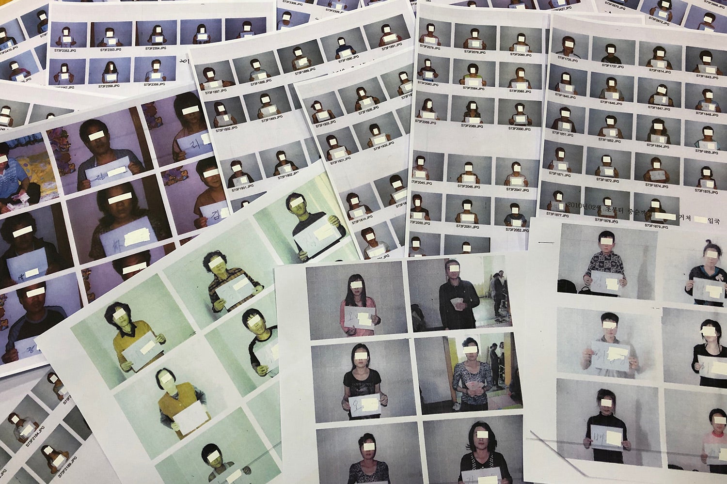 Photos of the North Korean refugees helped by the North Korea Refugees Human Rights Association of Korea are displayed in Seoul, South Korea on June 11, 2019.