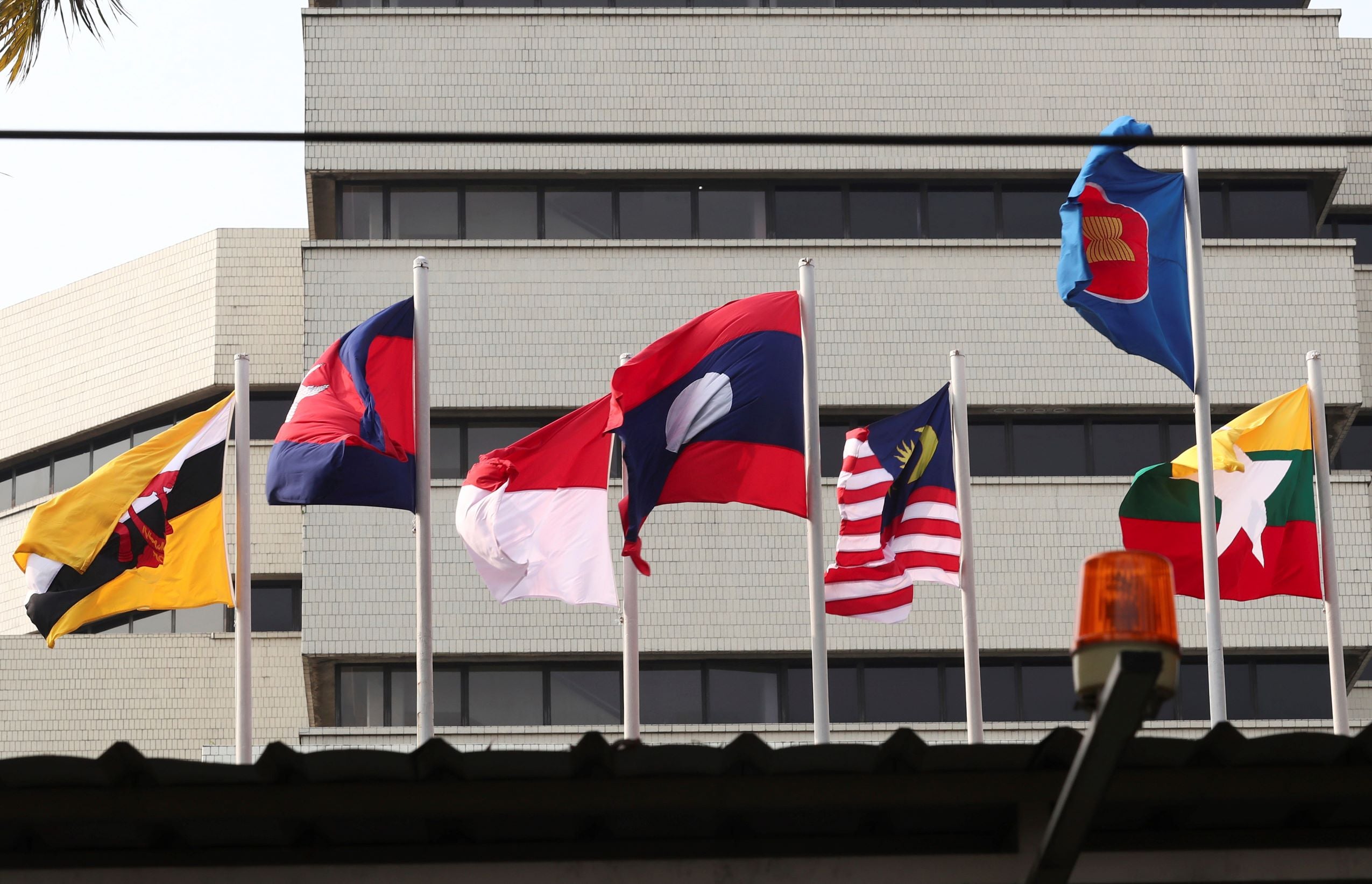 Flags of member countries fly at the ASEAN Secretariat in Jakarta, Indonesia, April 22, 2021.