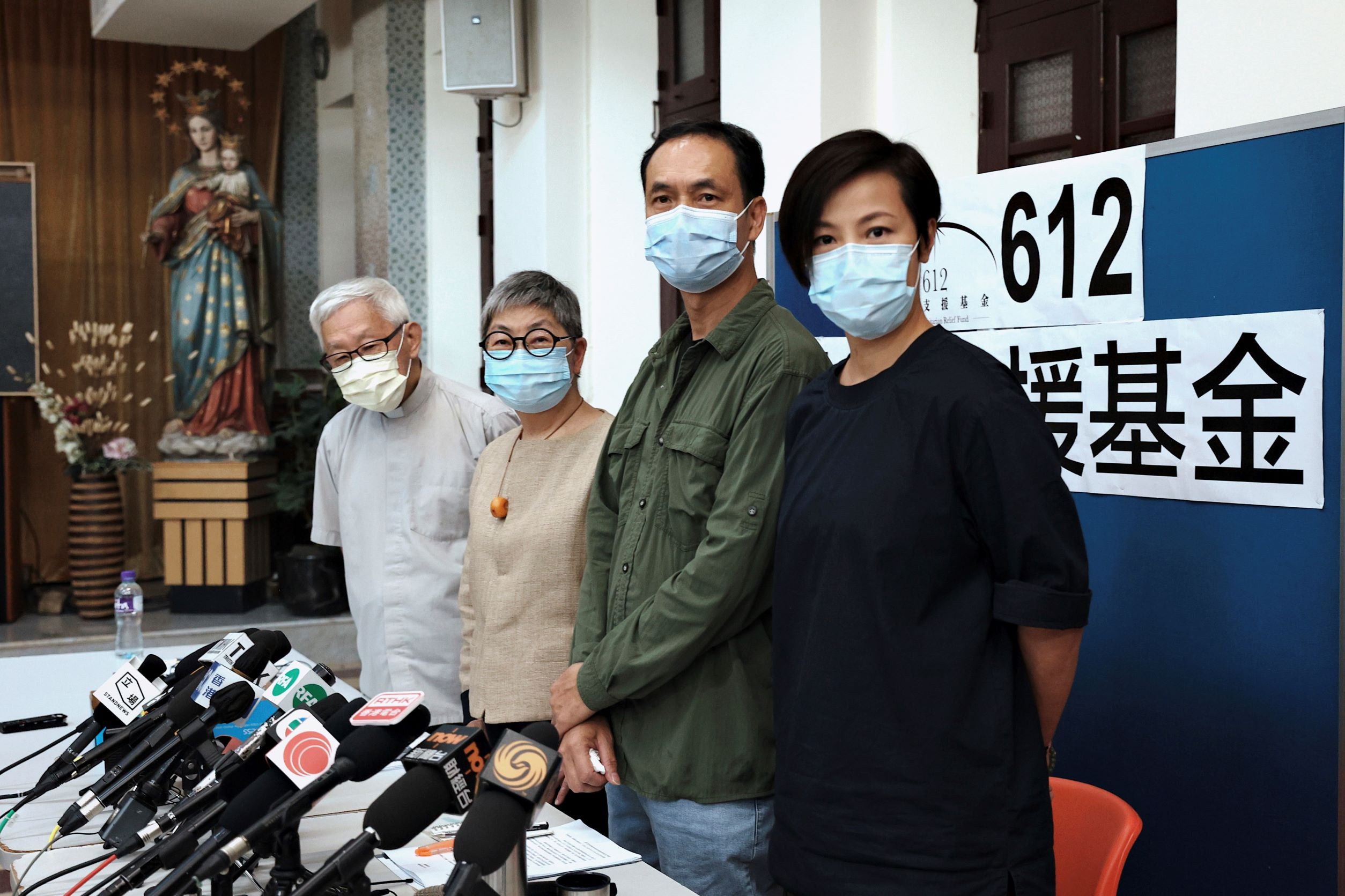 From left, retired Archbishop of Hong Kong Cardinal Joseph Zen, barrister Margaret Ng, Professor Hui Po-Keung, and singer Denise Ho attend a press conference to announce the closure of the 612 Humanitarian Relief Fund