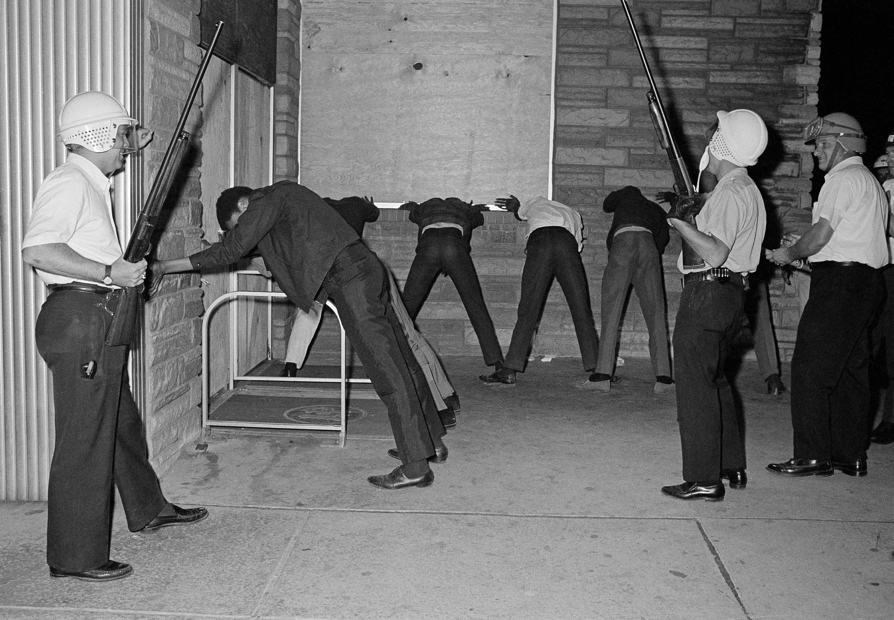 Eight Black men are frisked by police 