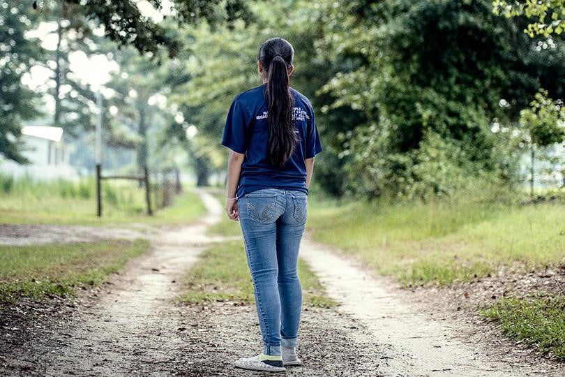 17-year-old tobacco worker on a dirt road 