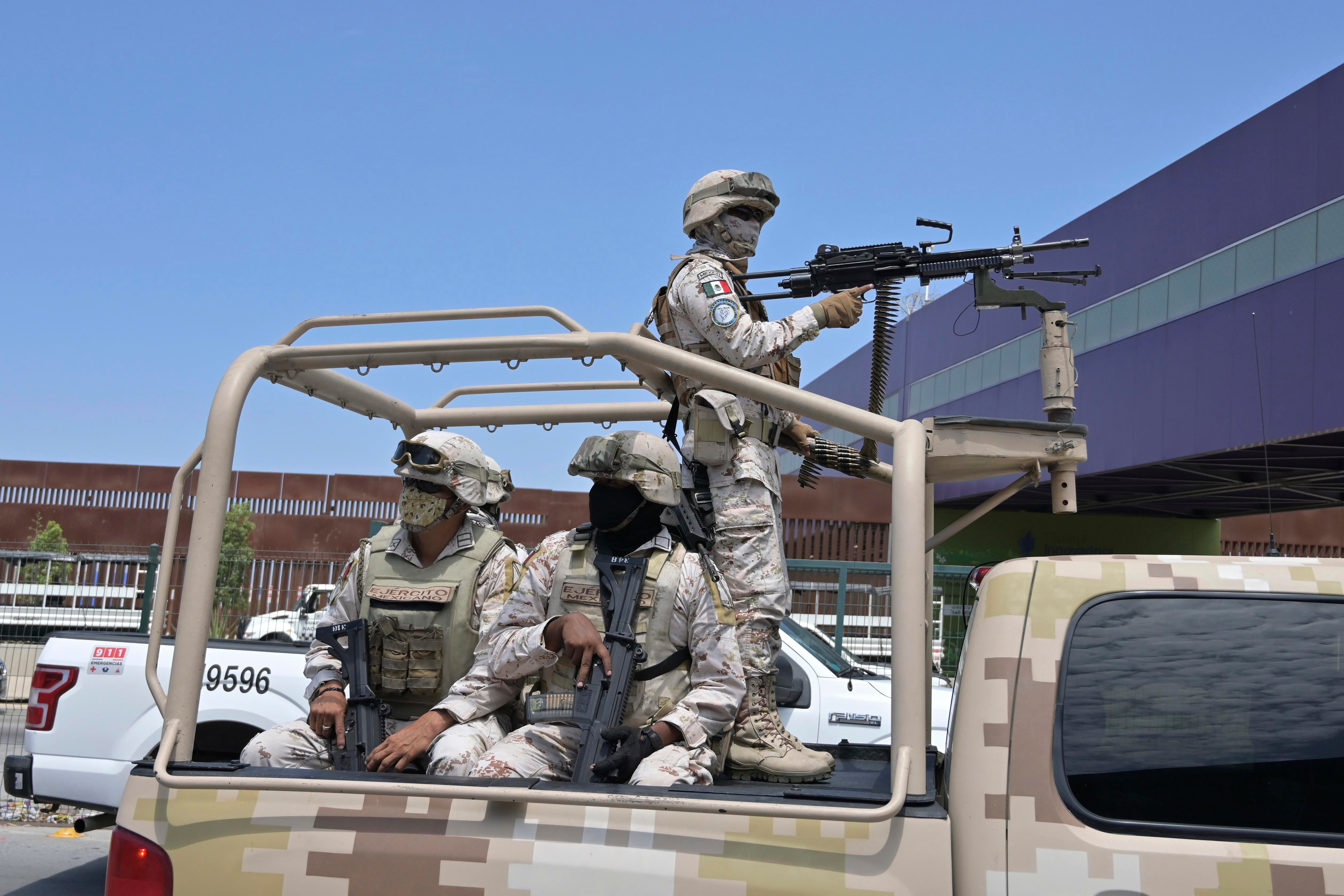 Hundreds of military troops joined Mexico's national guard on patrol following attacks by criminal groups in Tijuana, August 13, 2022.
