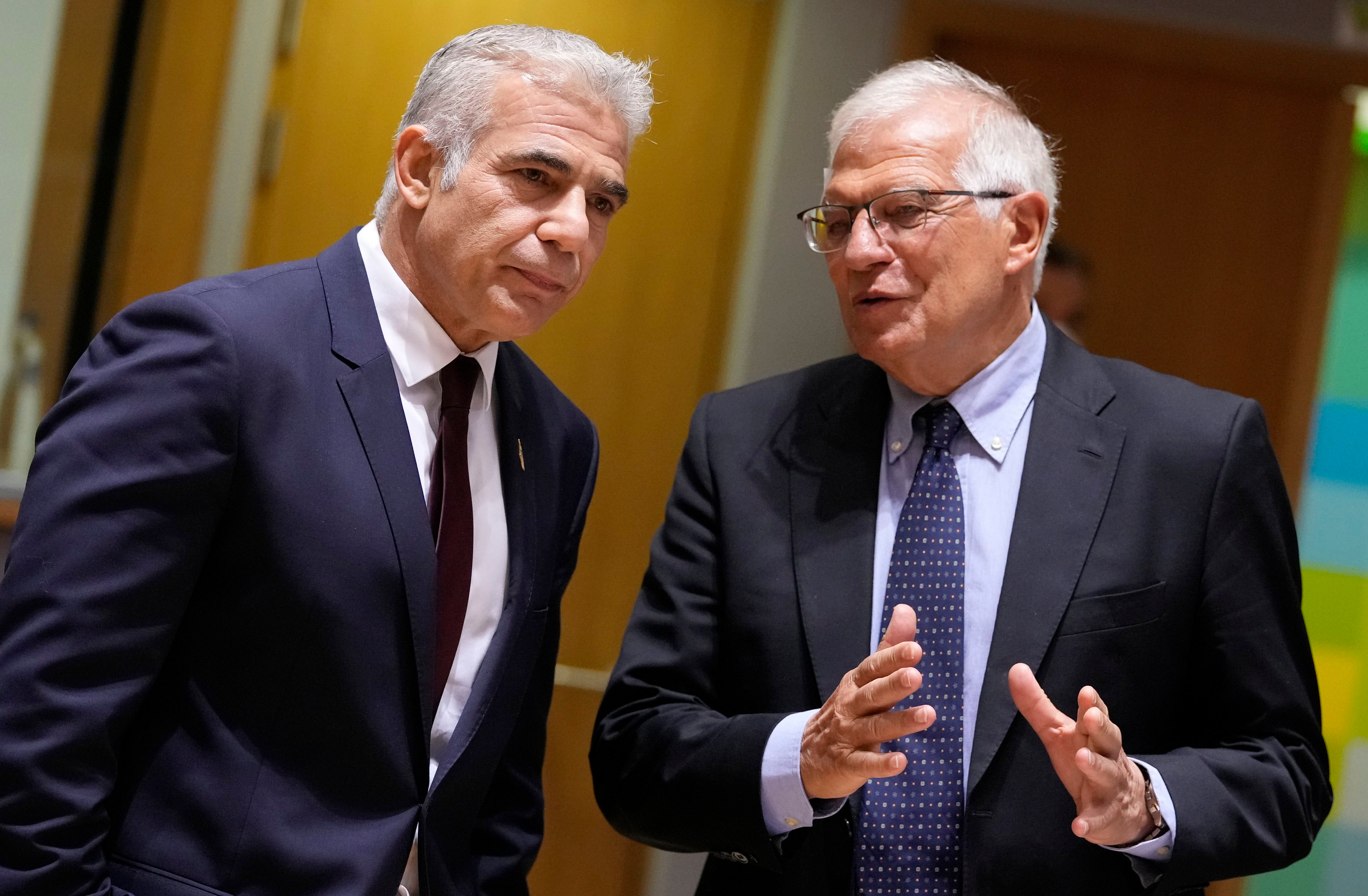 Yair Lapid, then Israeli foreign minister and current prime minister, speaks with the EU’s High Representative for Foreign Affairs and Security Policy Josep Borell during a July 2021 meeting of EU foreign ministers in Brussels.