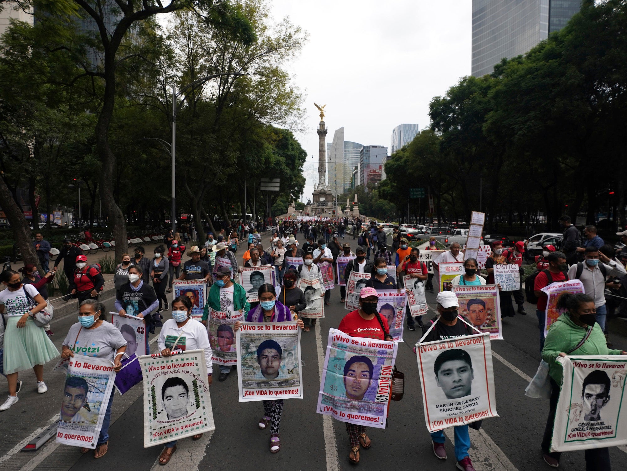 Families and friends march in Mexico City seeking justice for the missing 43 Ayotzinapa students on the eighth anniversary of their disappearance.
