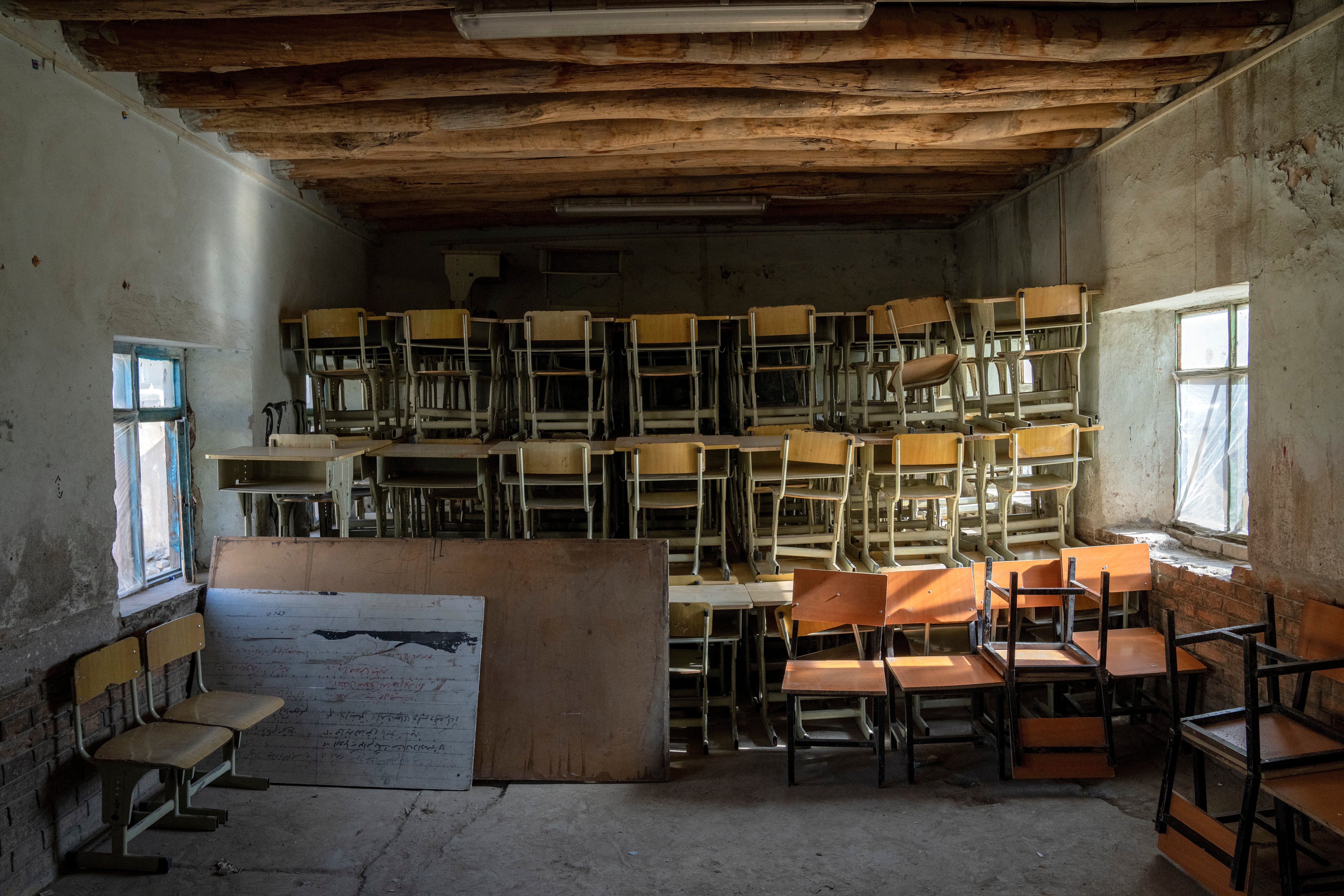 A classroom that previously was used for girls sits empty in Kabul