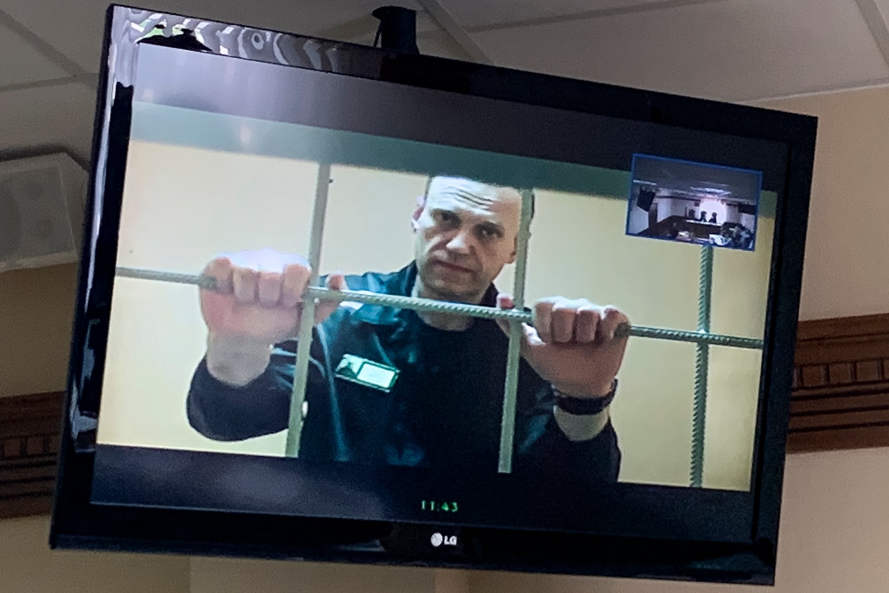 Russian opposition leader Alexei Navalny appears from prison on a video link in a courtroom in Vladimir, Russia. 