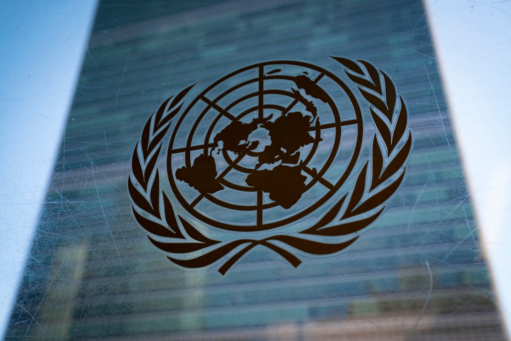 The symbol of the United Nations is displayed outside the Secretariat Building, Feb. 28, 2022, at United Nations Headquarters. (AP Photo/John Minchillo, File)
