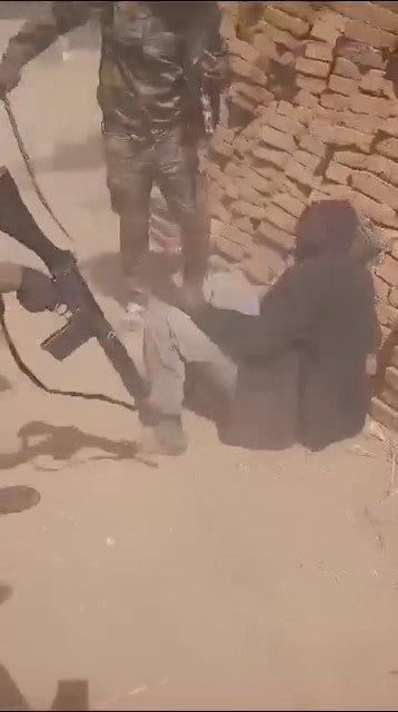 A video shows Rapid Support Forces rounding up a group of men in Ardamata. One man is repeatedly whipped and hit. © 2023 Private. 
