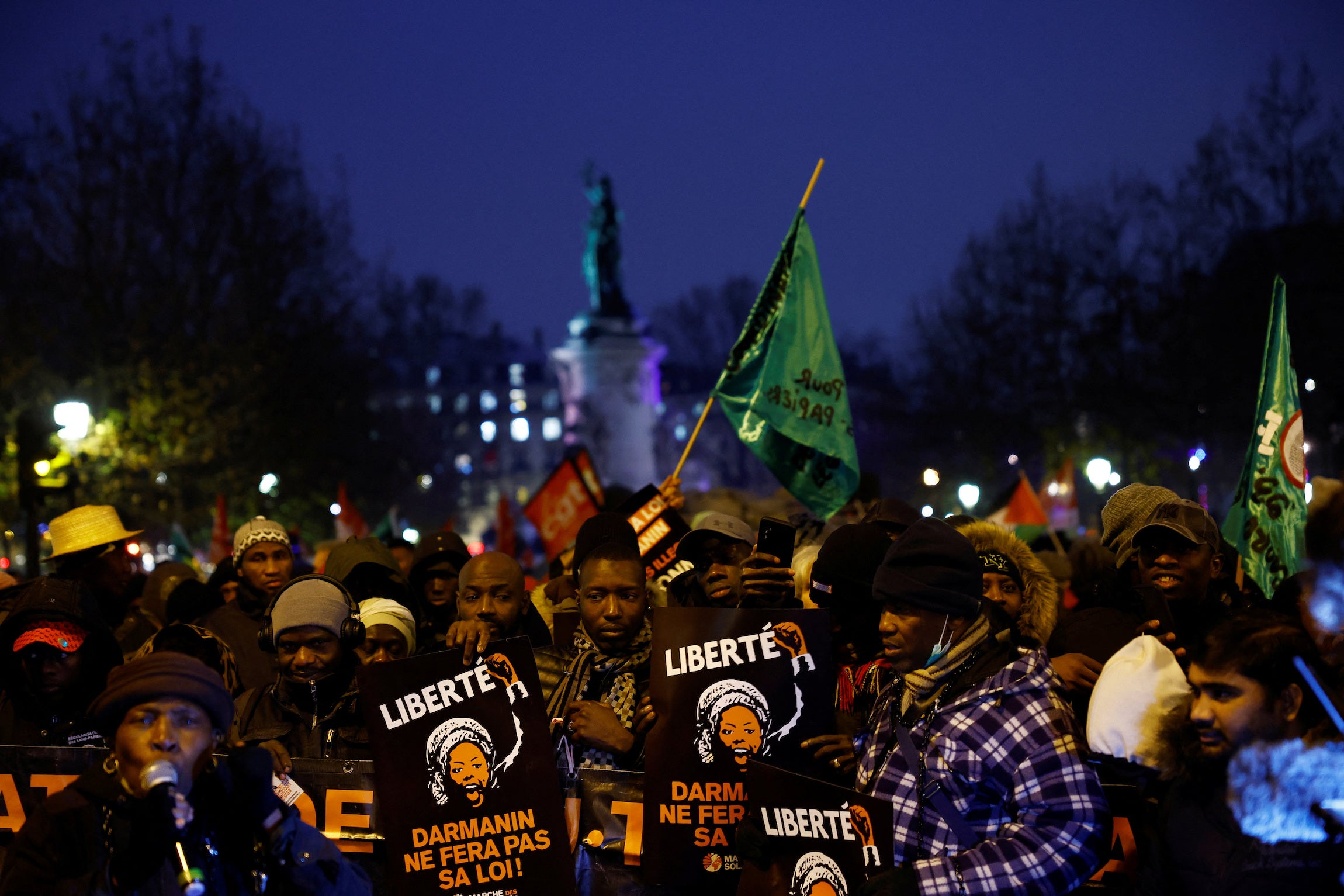 Protesters attend a demonstration against an immigration bill at the Place de la Republique in Paris, France, December 18, 2023. 