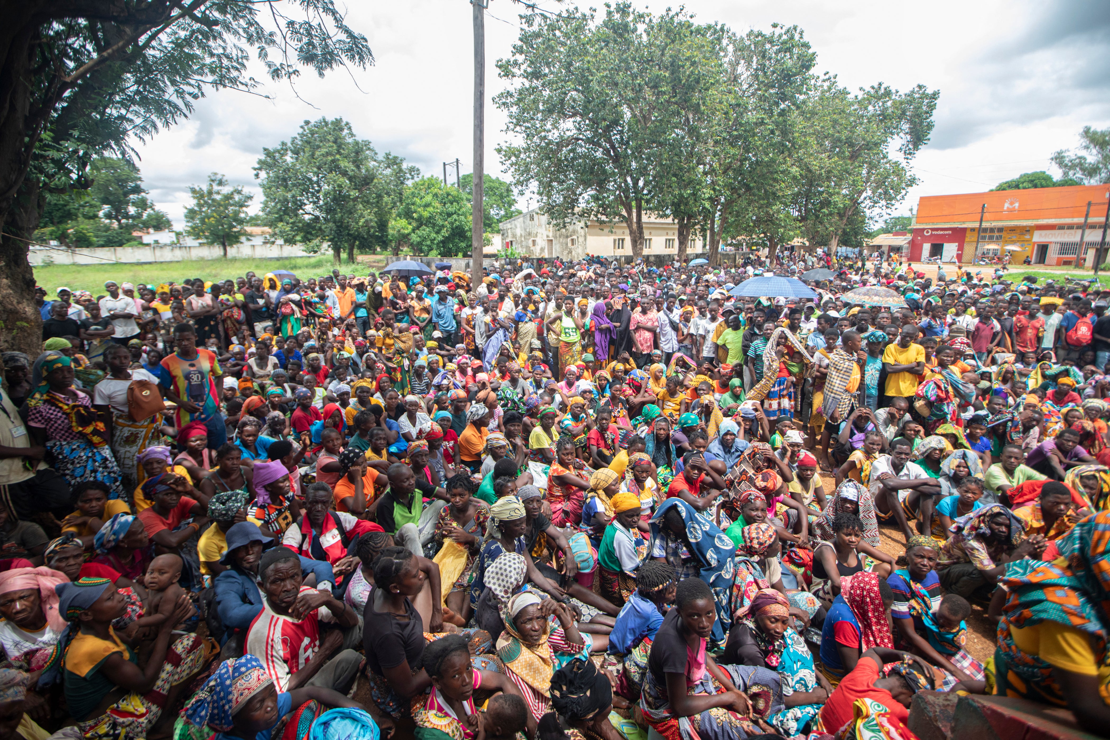 Displaced people from the province of Cabo Delgado gather to received humanitarian aid from the World Food Program in Namapa, Mozambique, February 27, 2024. 