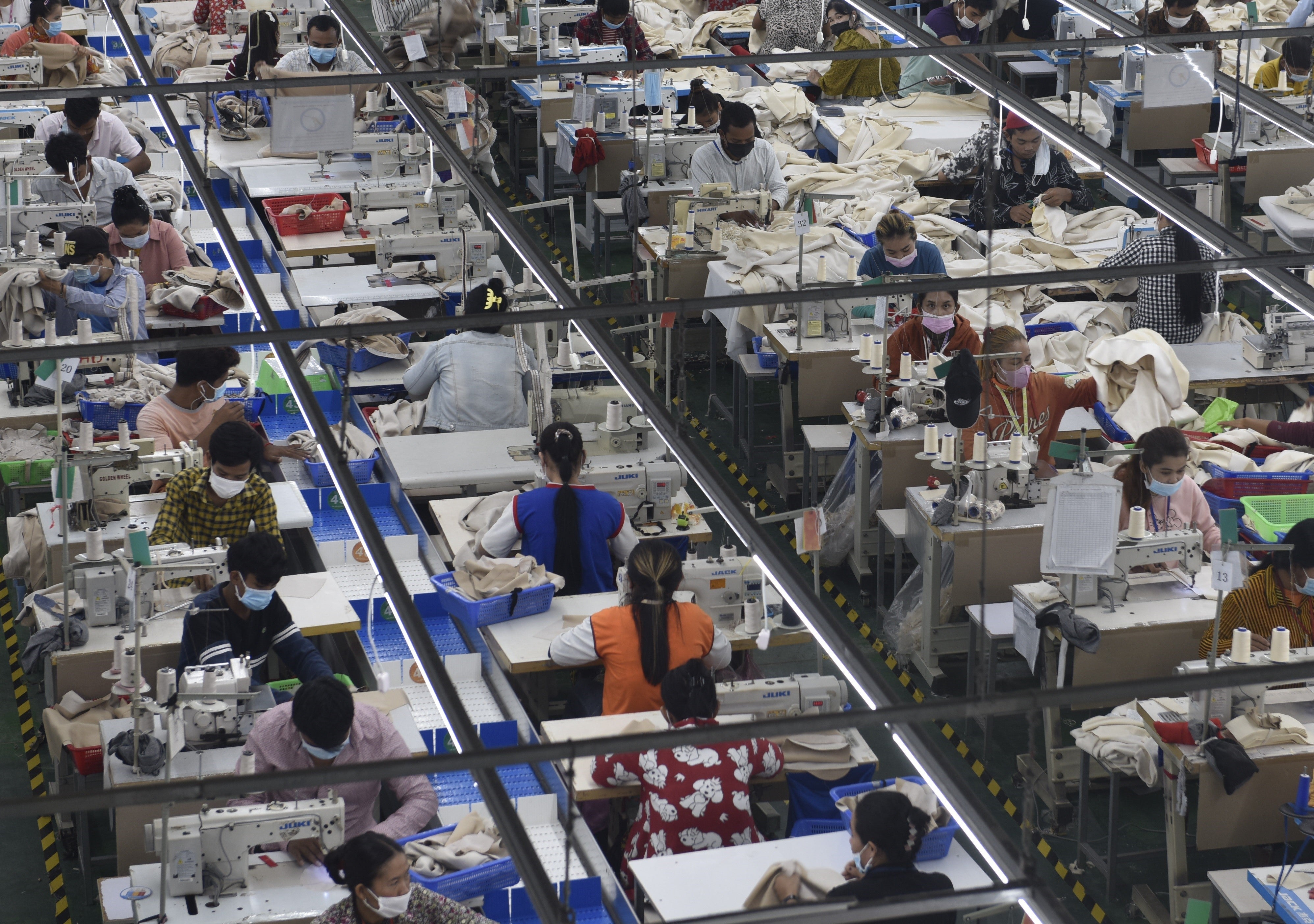 Garment workers at a factory in Phnom Penh, Cambodia, December 17, 2021.