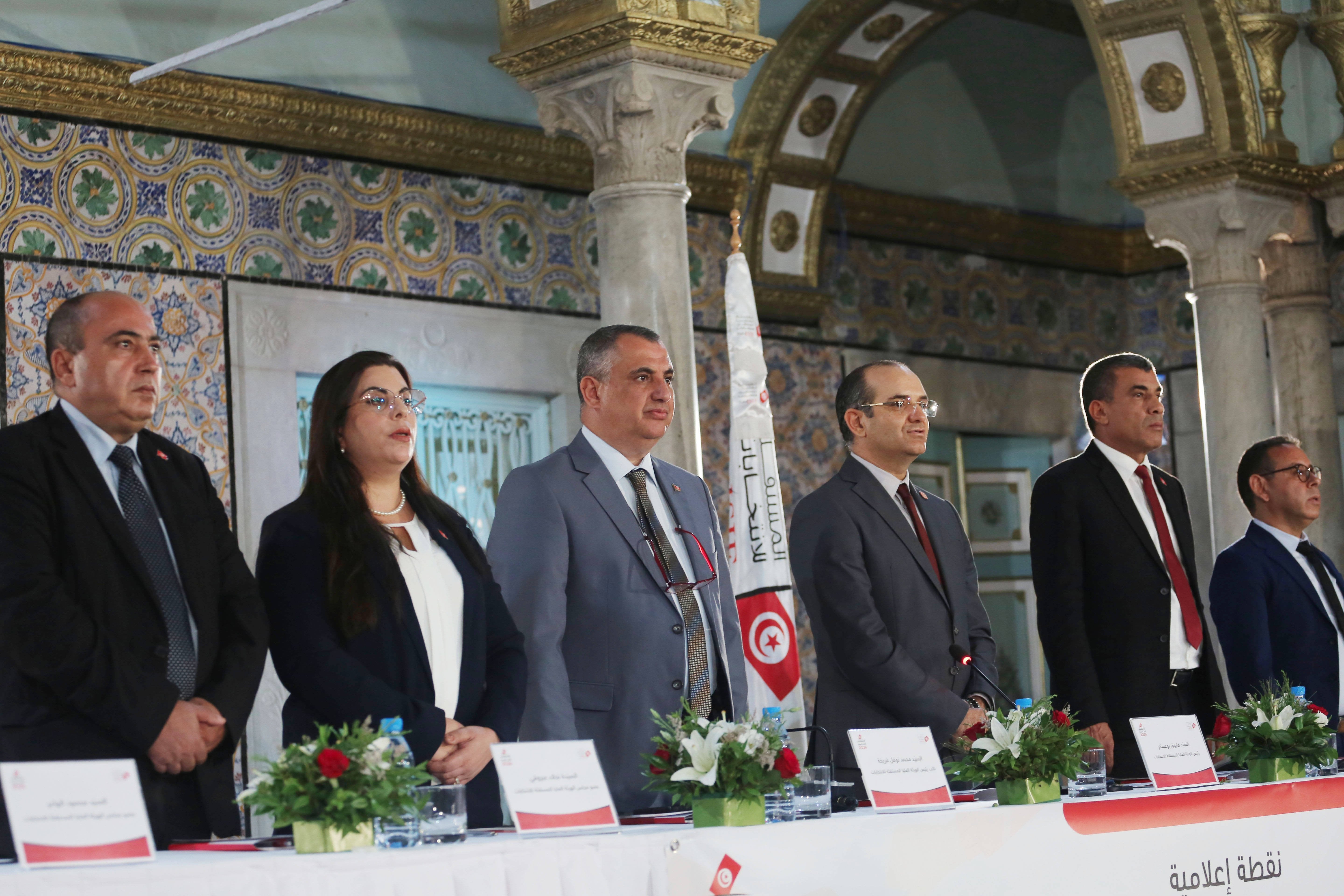 The Chairman of the Independent High Electoral Body (ISIE) Farouk Bouasker, (3-R) at a press conference to announce just three preliminary candidates for the presidential election to be held in Tunis on August 10, 2024. 