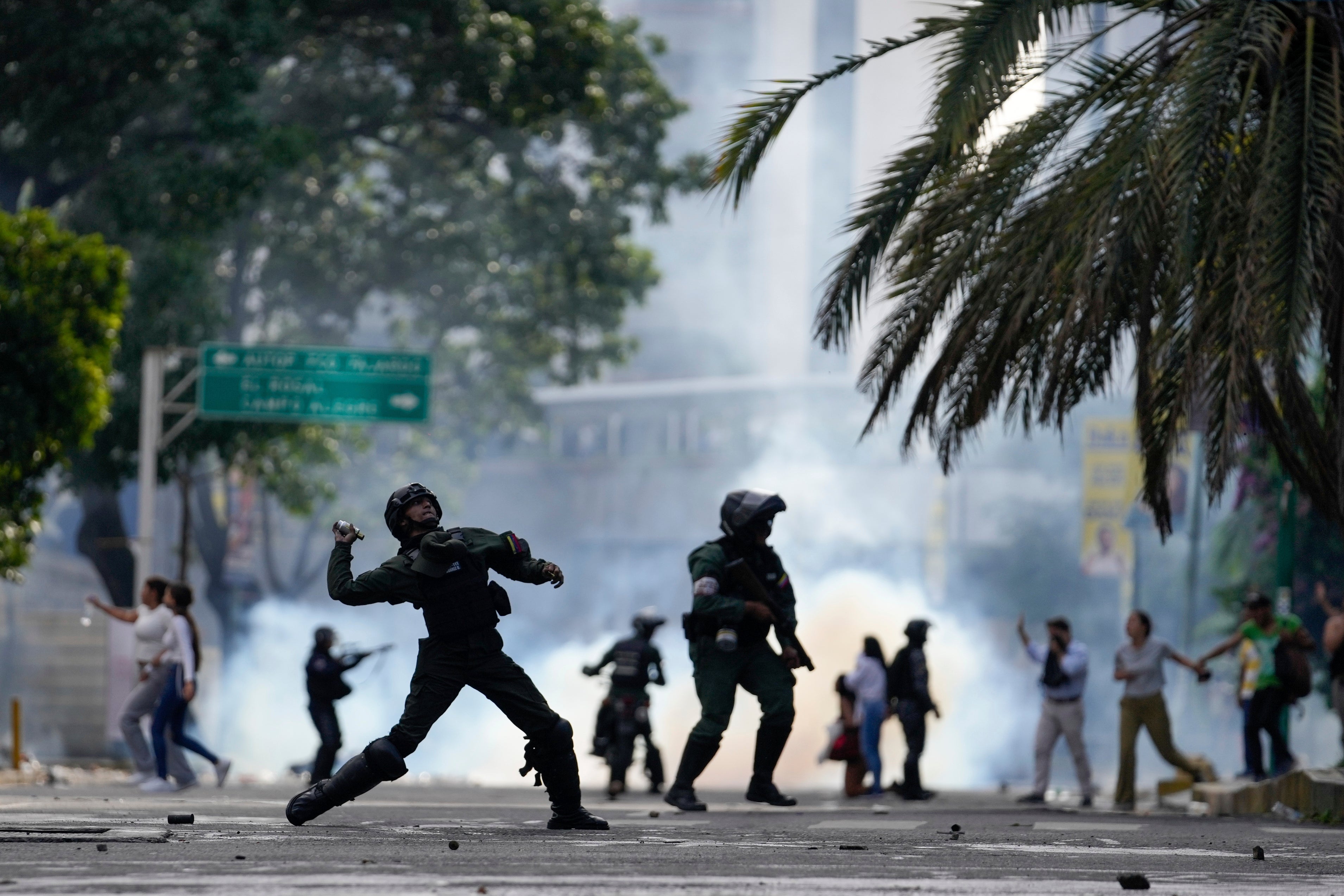 Police hurl a tear gas canister at protesters demonstrating against the announced election results declaring Nicolas Maduro's reelection, the day after the vote, in Caracas, Venezuela, July 29, 2024.
