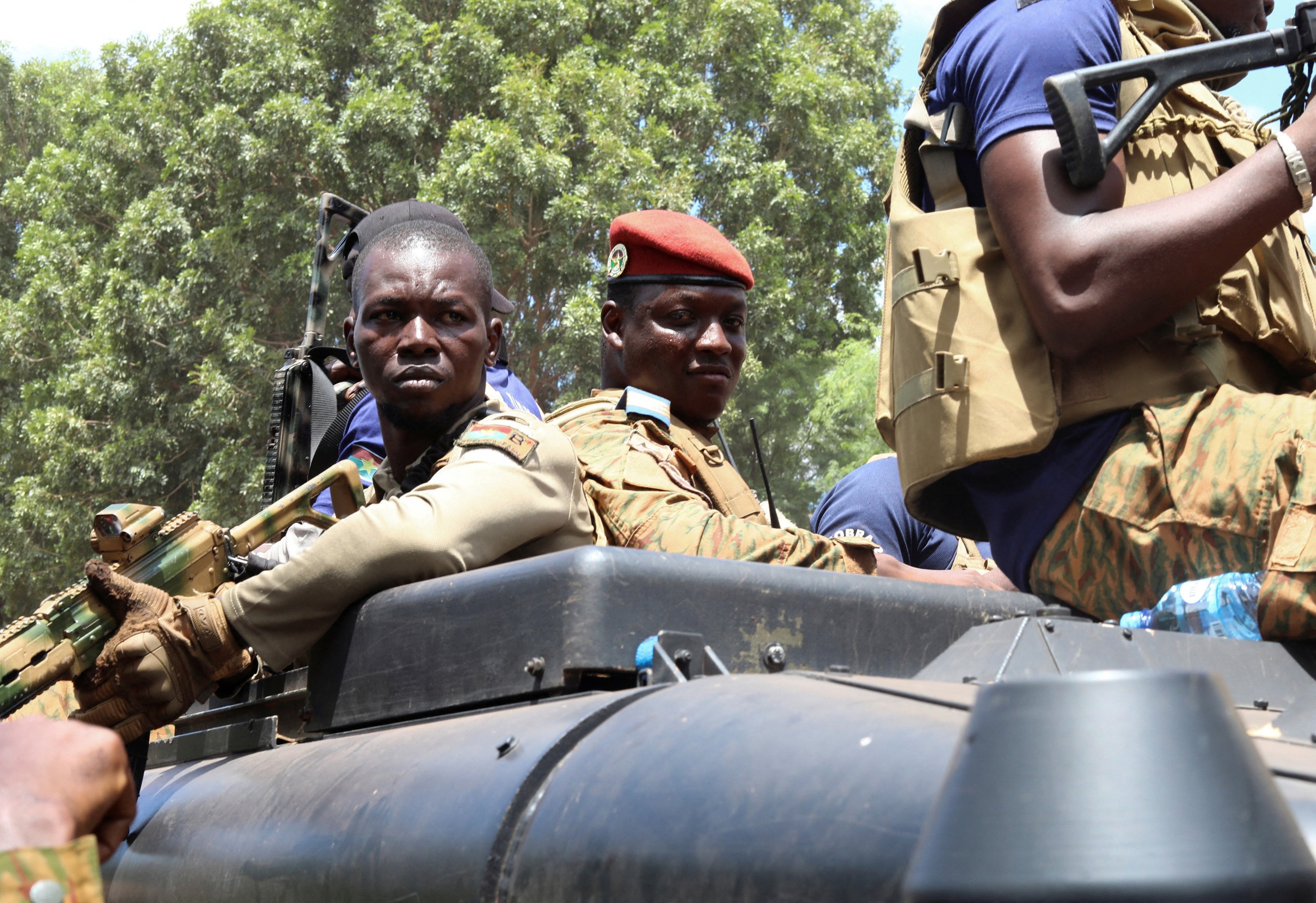 Burkina Faso's president, Capt. Ibrahim Traore (center), in an armored vehicle in Ouagadougou, October 2, 2022.