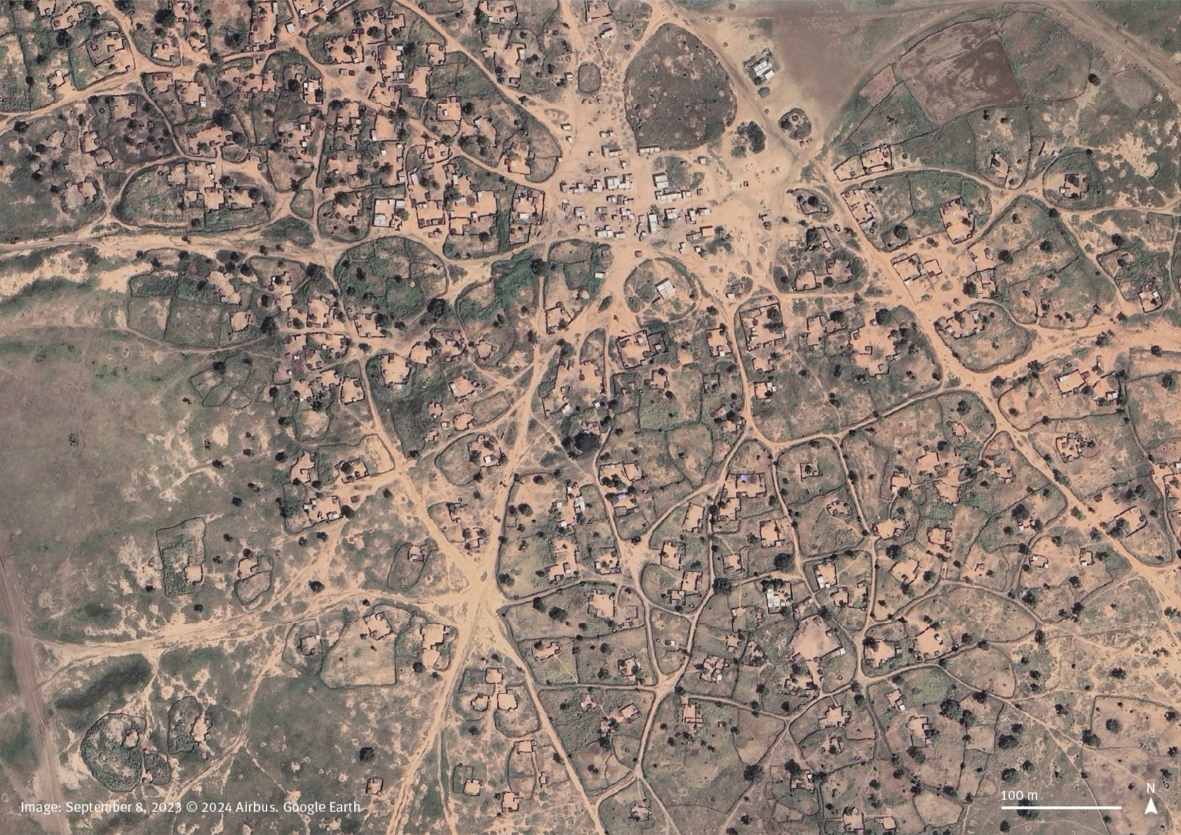 Satellite imagery comparison between September 8, 2023, and April 4, 2024, shows missing corrugated metal rooftops on the market and most of the other buildings in the town of Fayu, South Kordofan, Sudan. Debris is visible around the market as well as some burned houses in the southern part of the town.