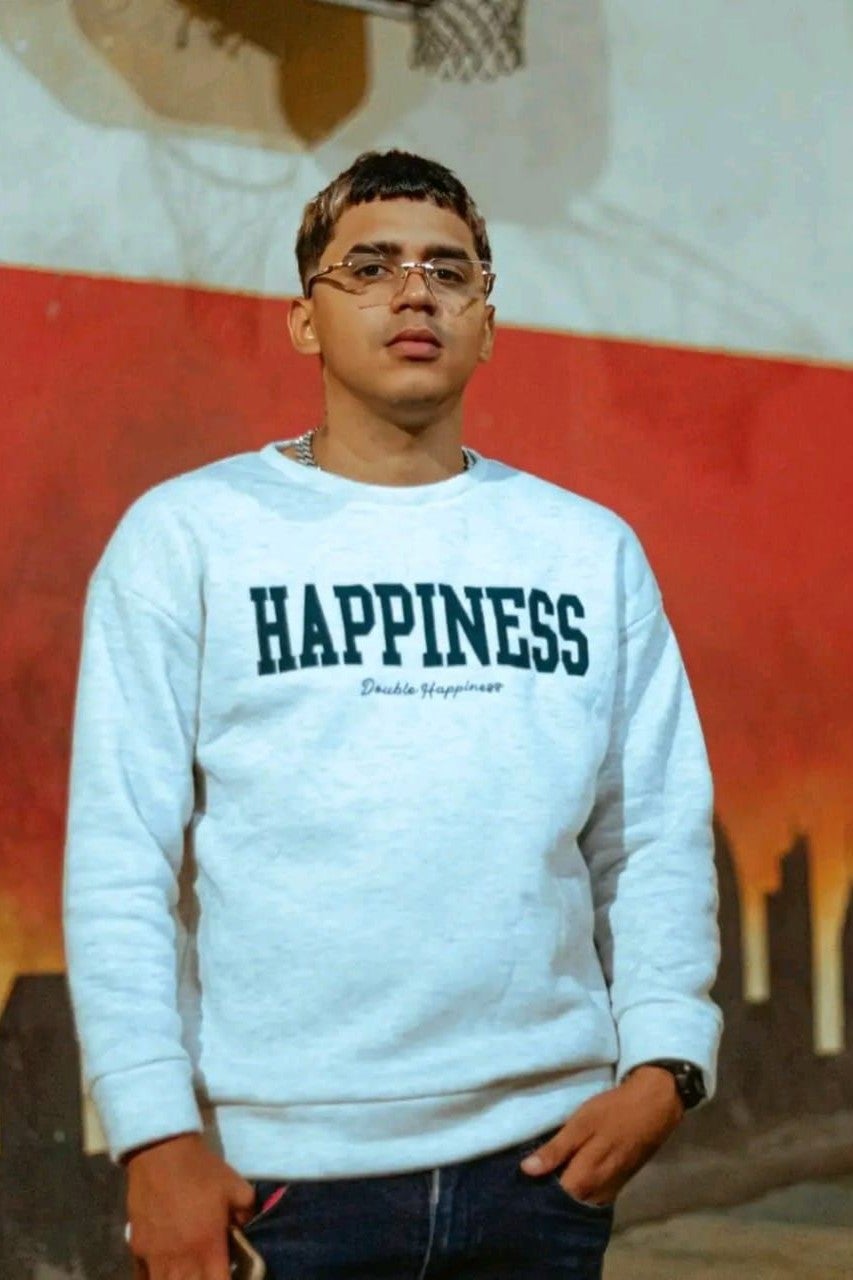 A young man posing for a photo