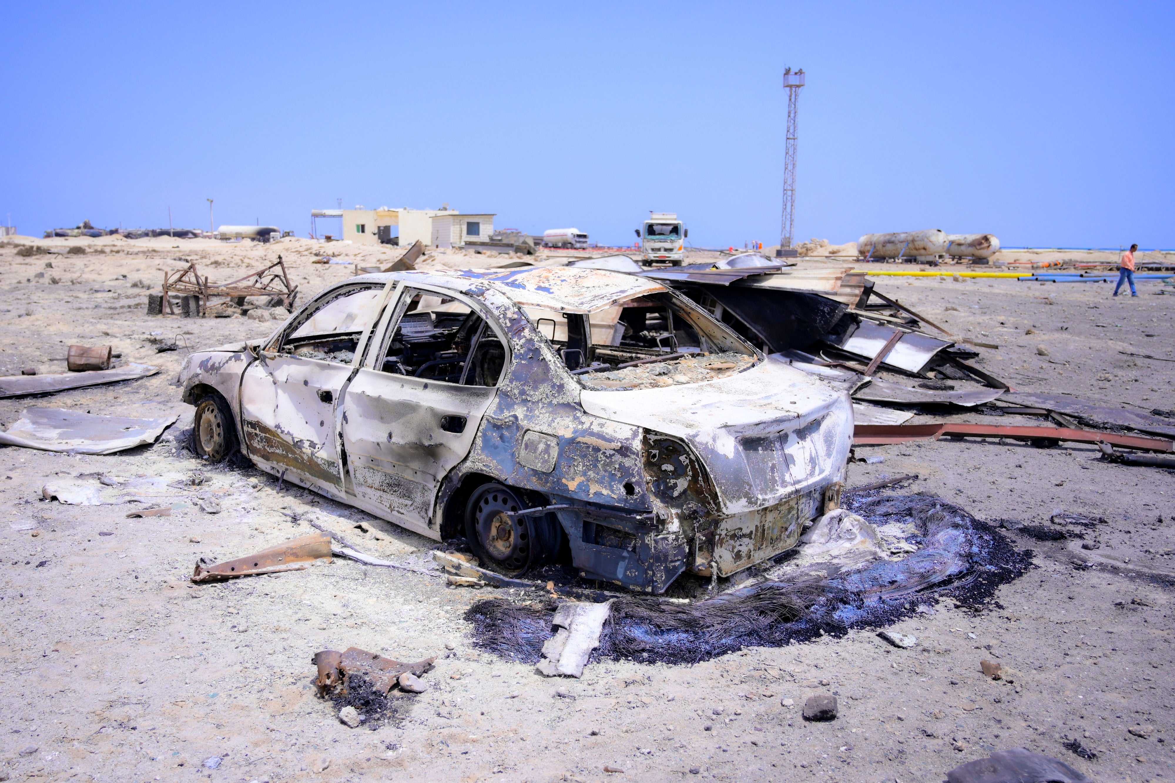 Burned vehicles near Ras Issa port in Hodeidah, Yemen following US strikes on April 17, 2025. Photo taken on April 18, 2025.