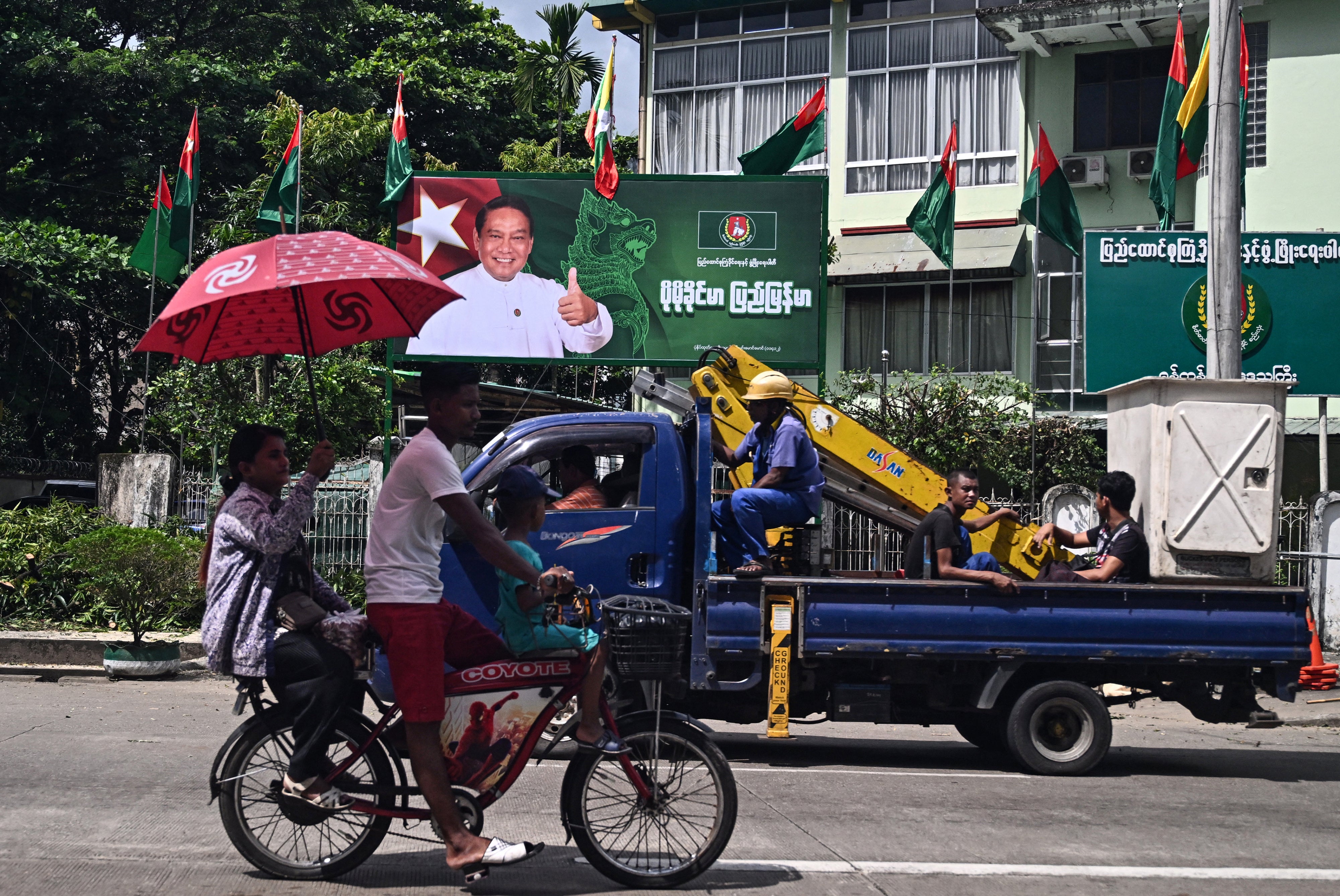 A billboard of the chairman of the Myanmar military-backed Union Solidarity and Development Party ahead of the start of the campaign period for the junta’s elections in Yangon, October 27, 2025. 