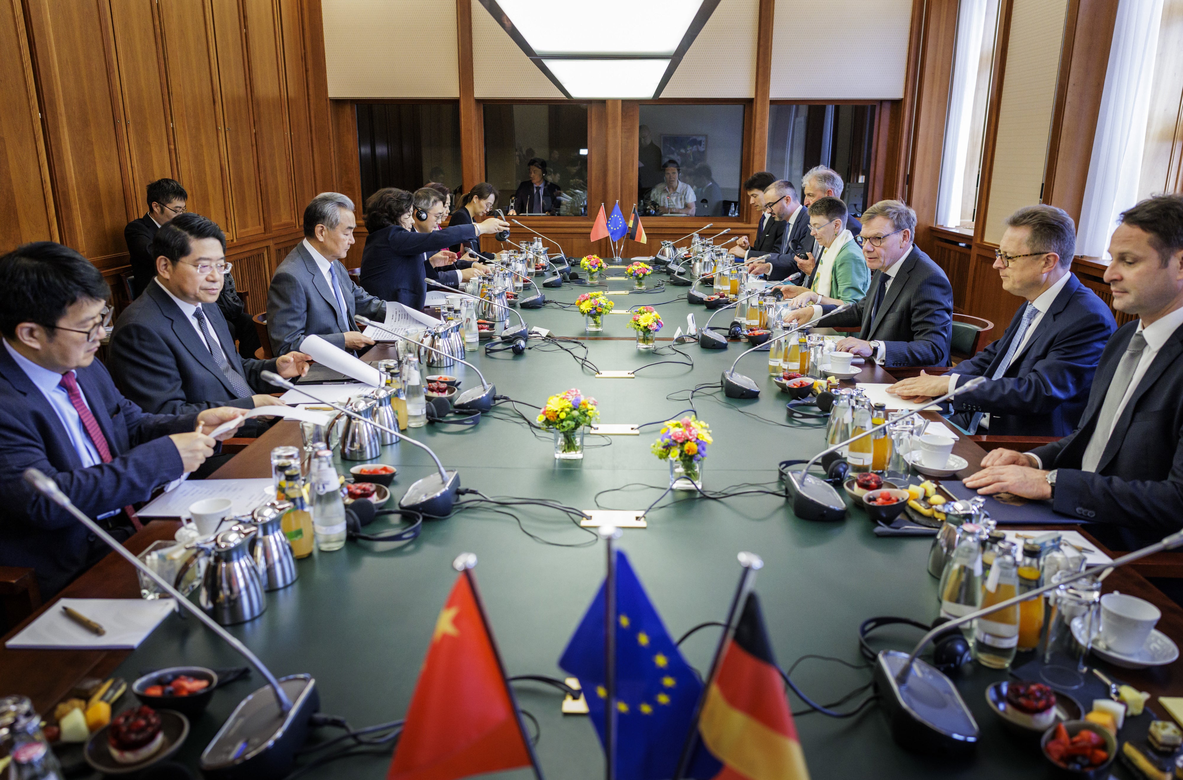 German Foreign Minister Johann Wadephul (third from right) meets with Chinese Foreign Minister Wang Yi during a Strategic Dialogue at the Federal Foreign Office, Berlin, July 3, 2025.  