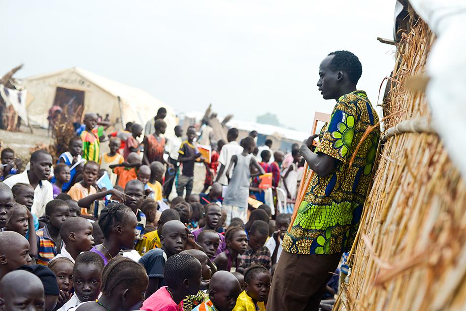 A math teacher in the UNMISS camp near Bentiu teaching boys and girls. The vast majority of camp inhabitants are children and women. 
