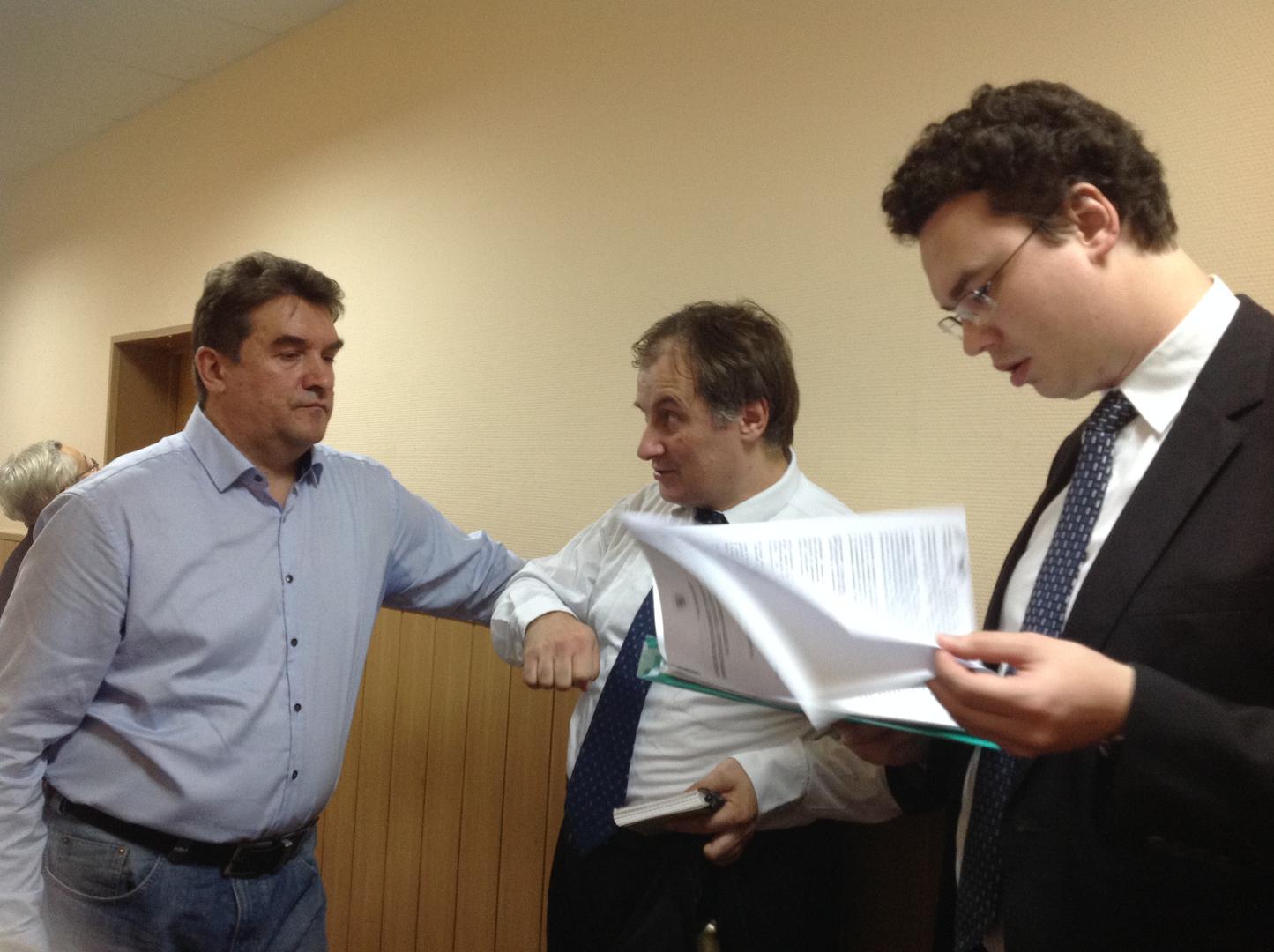 Representatives of Human Rights Center "Memorial" waiting for the court hearing to begin. September 28, 2015, Moscow.