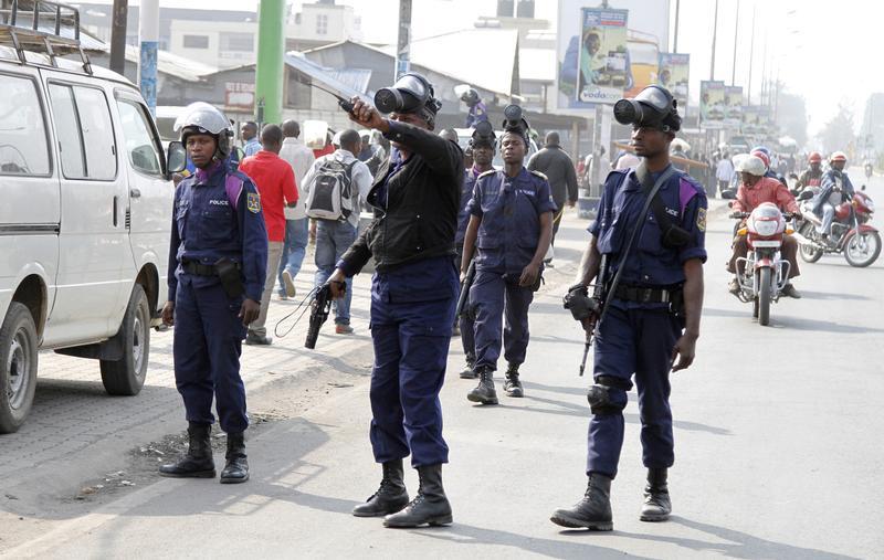 Riot police patrol a street in Goma, Democratic Republic of Congo, during nation-wide protests against a proposed change in the law that would delay elections, January 19, 2015.