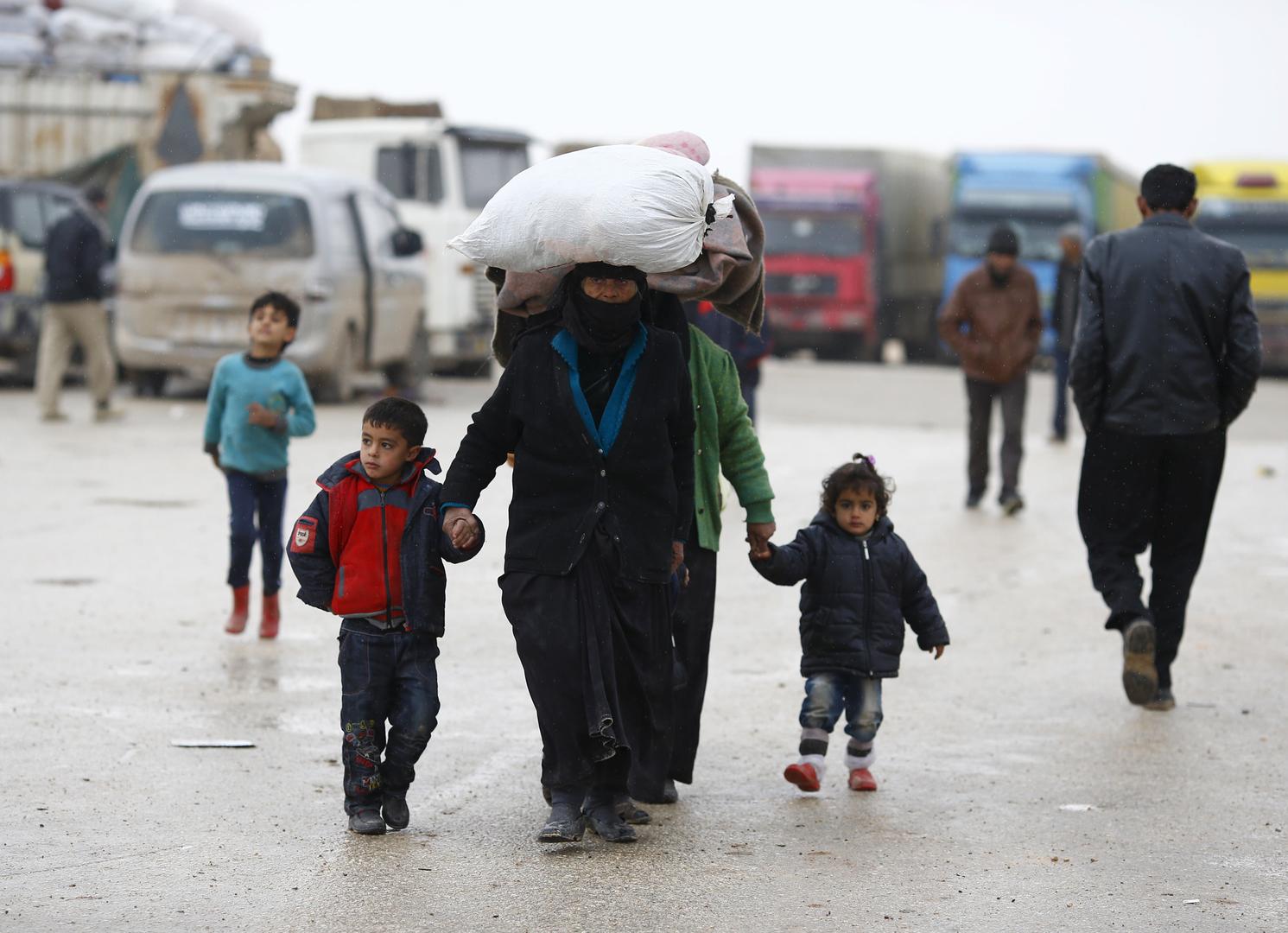 Syrians arrive at a camp for internally displaced persons on the outskirts of Azaz town, 5 kilometers south of Bab al-Salam and Turkey’s closed Öncüpınar border post on February 6, 2016. 
