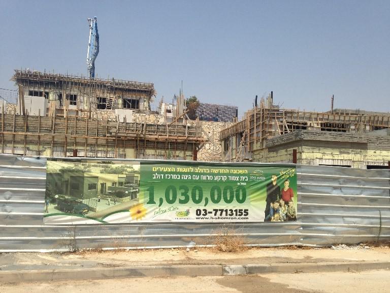 Advertisement for a new housing construction project in the Israeli settlement of Dolev: “The new neighborhood in Dolev for young couples”. 