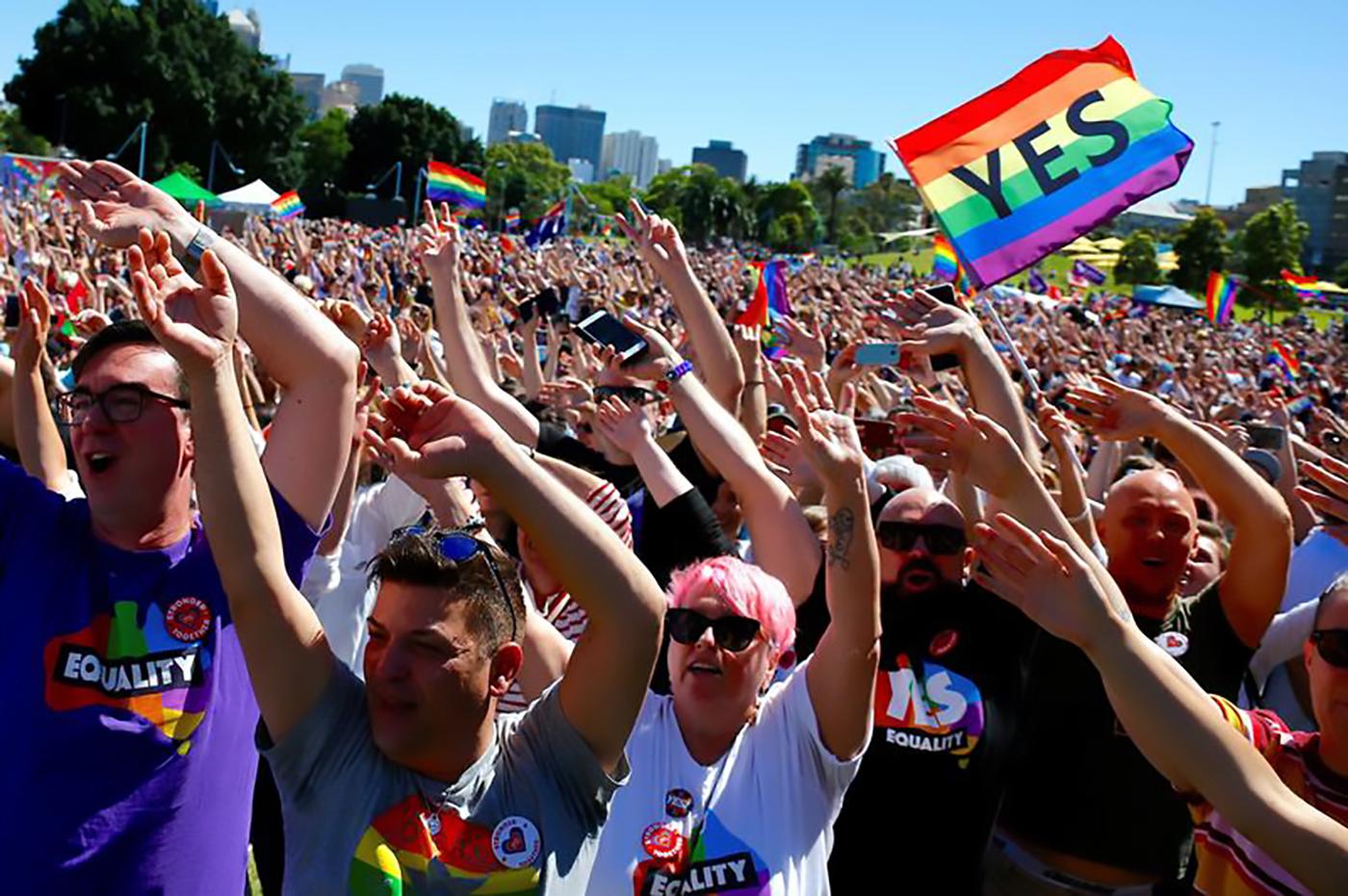 Supporters of the 'Yes' vote for marriage equality celebrate after it was announced the majority of Australians support same-sex marriage in a national survey, paving the way for legislation to make the country the 26th nation to formalise the unions by t