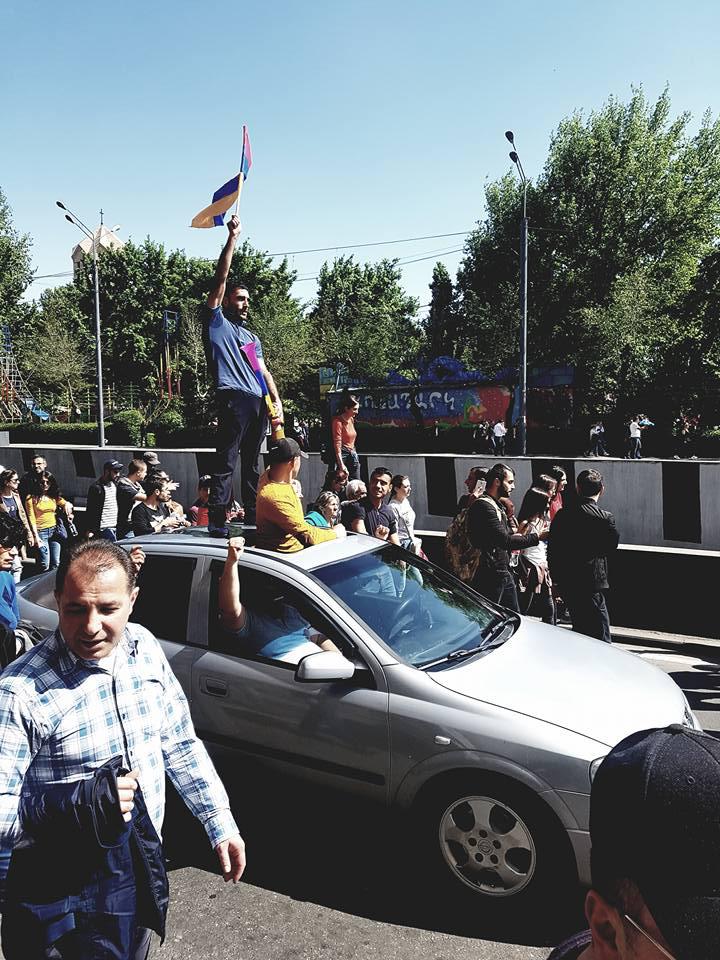 Protesters celebrate the resignation of Prime Minister Serzh Sargsyan following 11 days of protests, Yerevan, Armenia, April 23, 2018.
