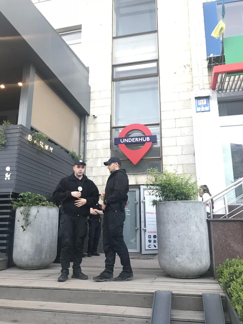 Kyiv police waiting outside the venue where an Amnesty International event was disrupted by members of radical groups.