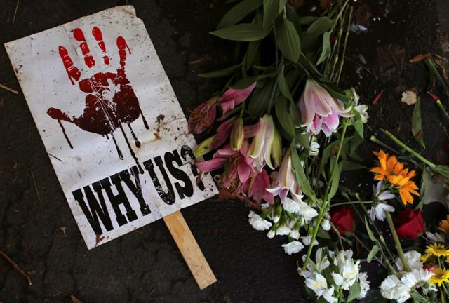 A memorial is pictured at the location where the police shooting of Keith Scott took place, in Charlotte, North Carolina, U.S., September 23, 2016.