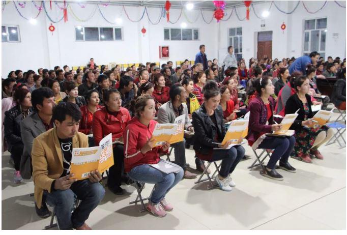 Turkic Muslim villagers attending Mandarin classes. For some, attendance is compulsory.