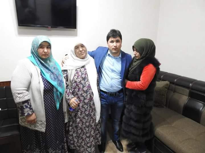 Opposition figure Sharoffidin Gadoev at a meeting with his relatives in the presence of Tajik Interior Ministry officials in Dushanbe on February 15.