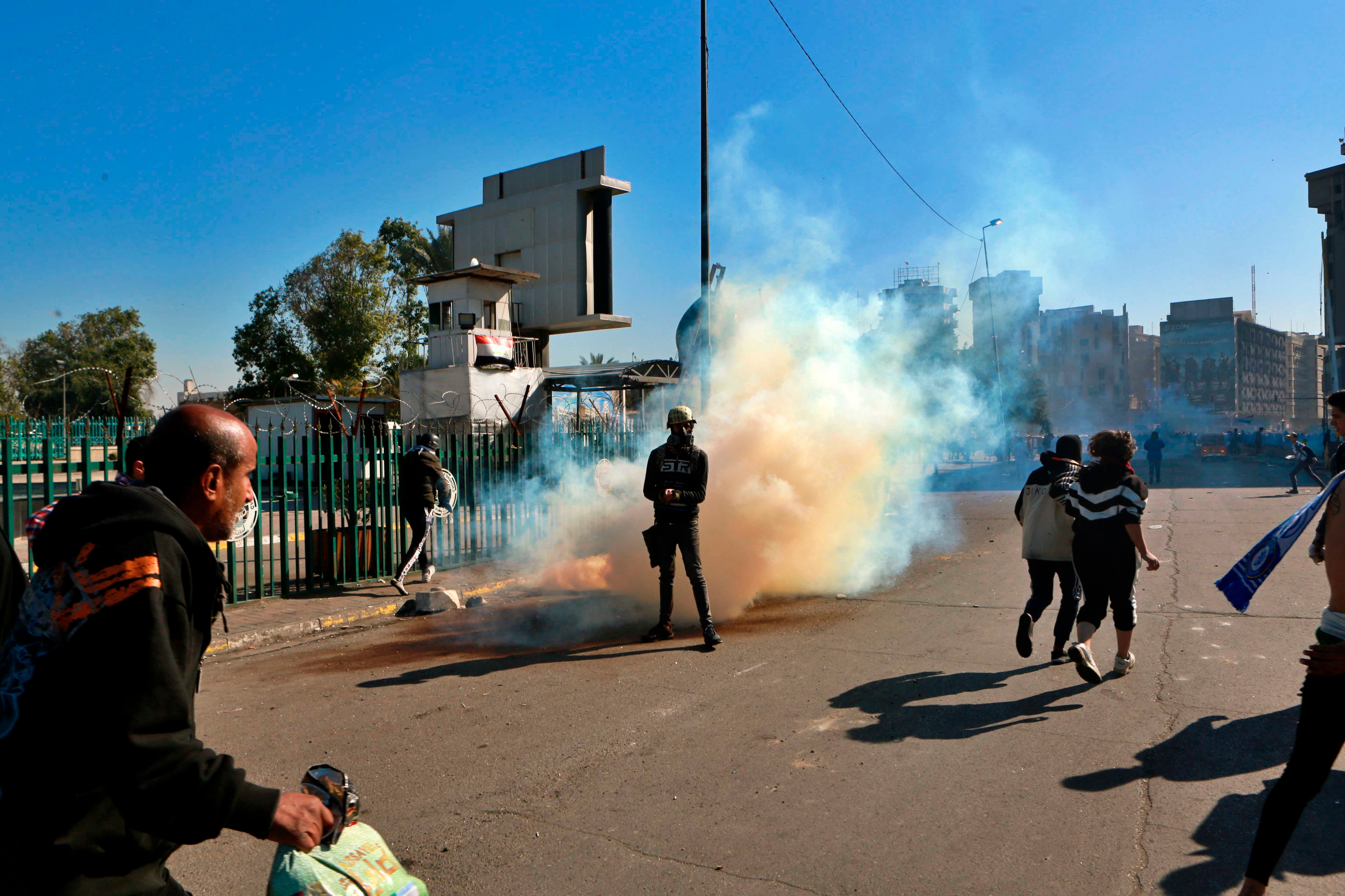 Security forces fire tear gas at protesters in Baghdad, Iraq, on January 27, 2020.