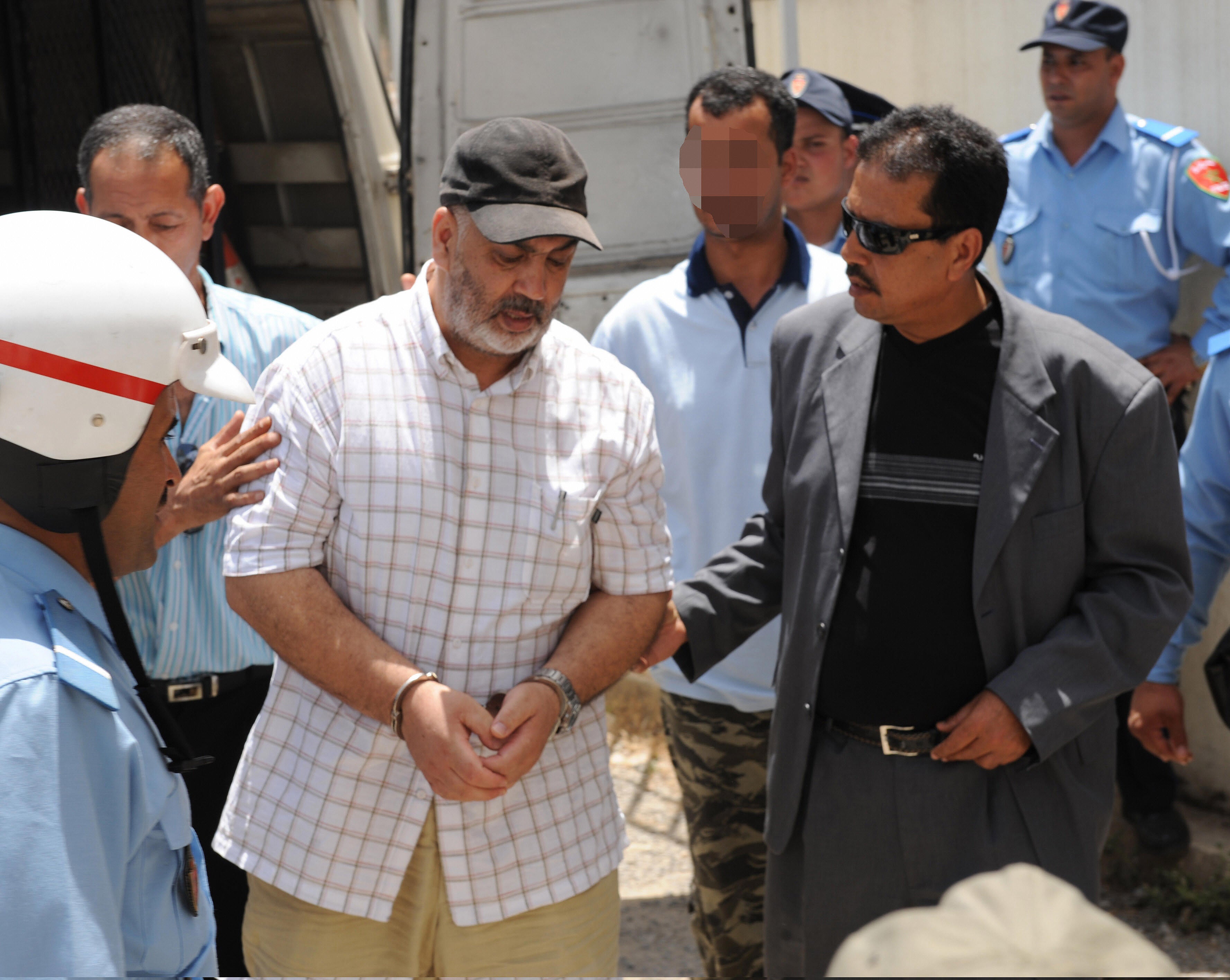 Abdelqader Belliraj, arriving at a courthouse in Salé, Morocco, in 2008. 