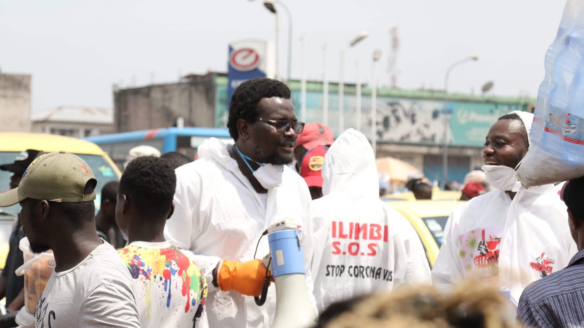 Pro-democracy activists from Filimbi movement raise awareness about the COVID-19 pandemic in Kinshasa’s Gambela market, Democratic Republic of Congo, March 28, 2020.