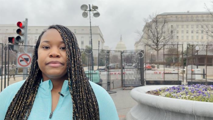 Dreisen Heath standing in front of US Capitol building