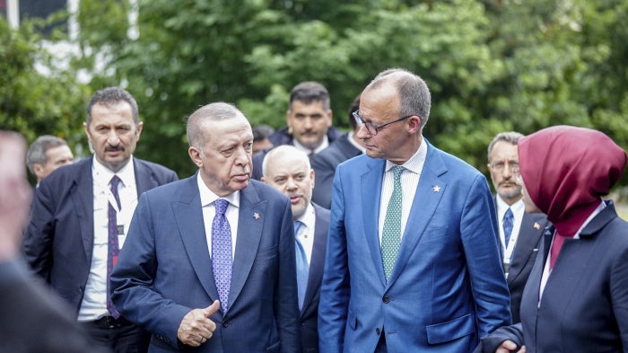 German Chancellor Friedrich Merz and President Recep Tayyip Erdoğan arrive at the European Political Community summit, May 16, 2025.
