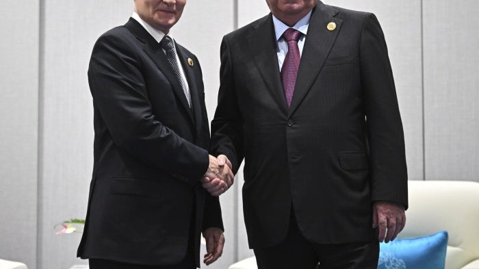 Russian President Vladimir Putin (L) and Tajik President Emomali Rahmon during their meeting in Tianjin, China, September 1, 2025.