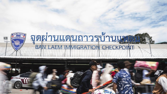 Migrant workers move through the Ban Laem Immigration Checkpoint on the Thai-Cambodian border, July 28, 2025.