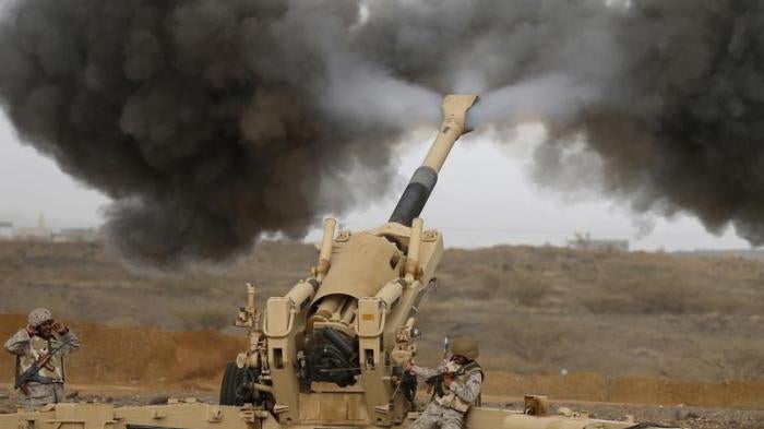 A Saudi artillery unit fires shells towards Houthi positions from the Saudi border with Yemen April 13, 2015. 