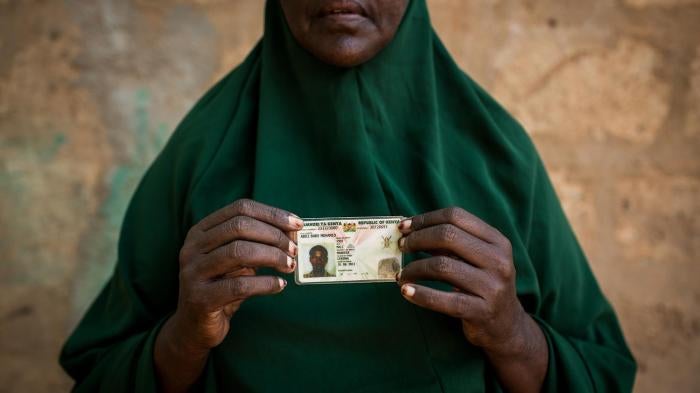 Zeinab Bulley Hussein holding the national identity card of her son, Abdi Bare Mohamed. Community members stumbled on Abdi Bare’s dead body 18 kilometers from Mandera, in northeastern Kenya, three weeks after police officers arrested him outside the famil