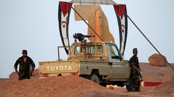 Polisario soldiers under the SADR flag in Bir Lahlou, Western Sahara, in 2016. 