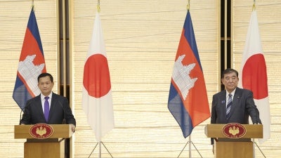 Japanese Prime Minister Shigeru Ishiba (R) and Cambodian Prime Minister Hun Manet attend a news conference after a bilateral talk at the Prime Minister's Office in Tokyo, May 30, 2025. 